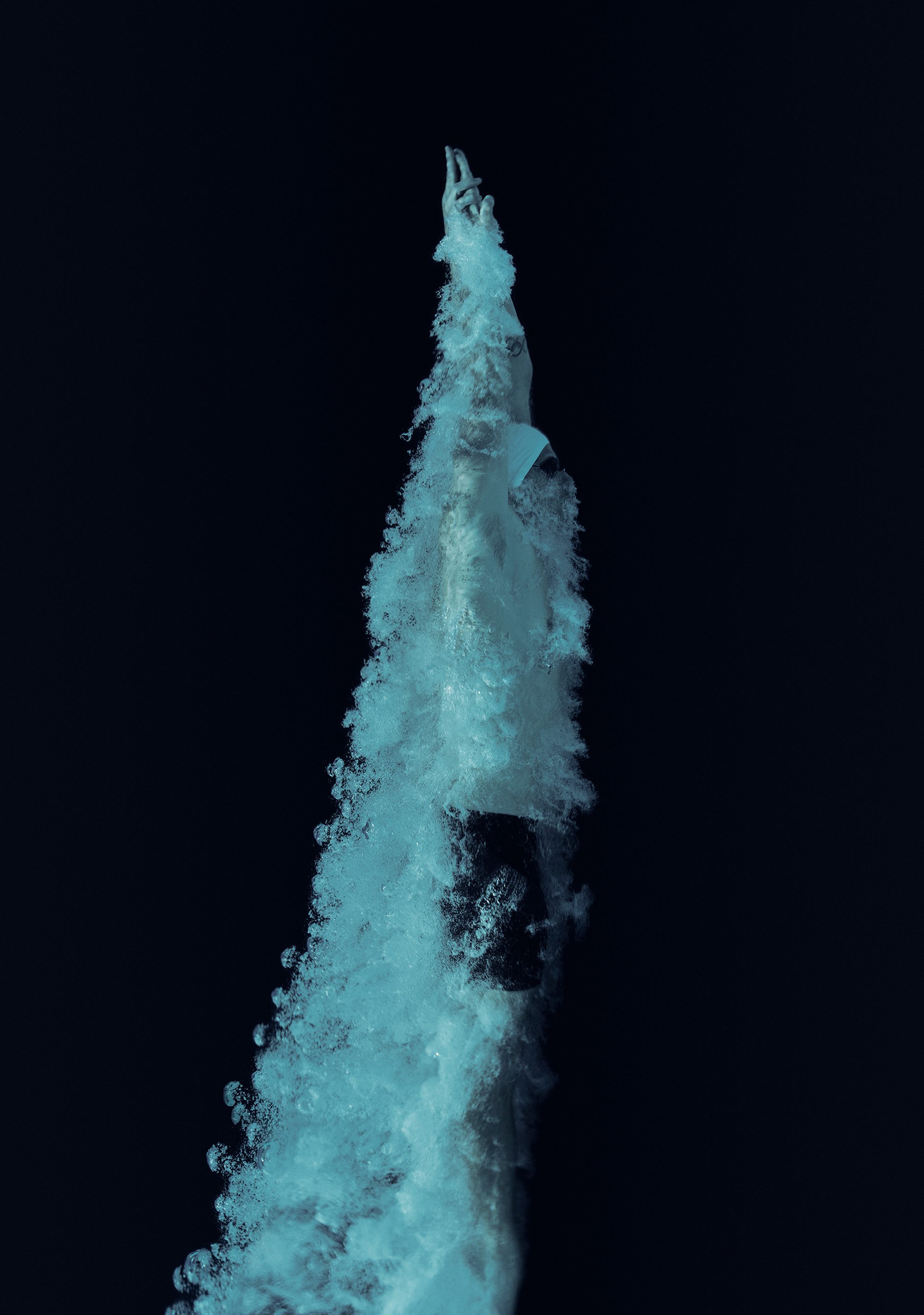 a wave of water on a dark background