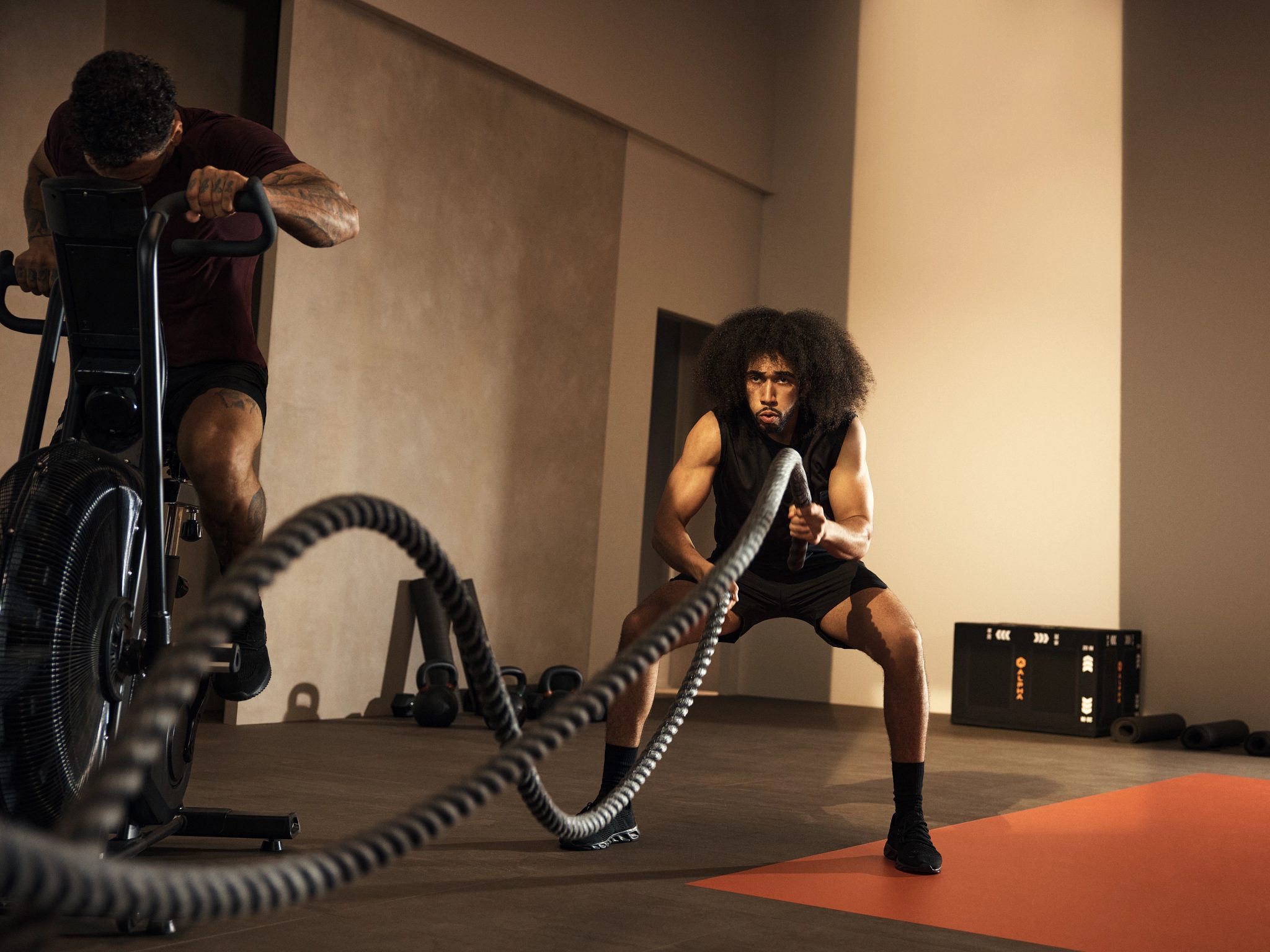 Alpha class member working out with battle rope