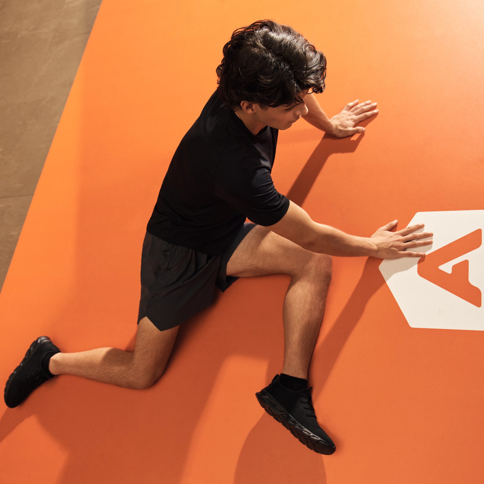 Alpha class member stretching in spinal twist position