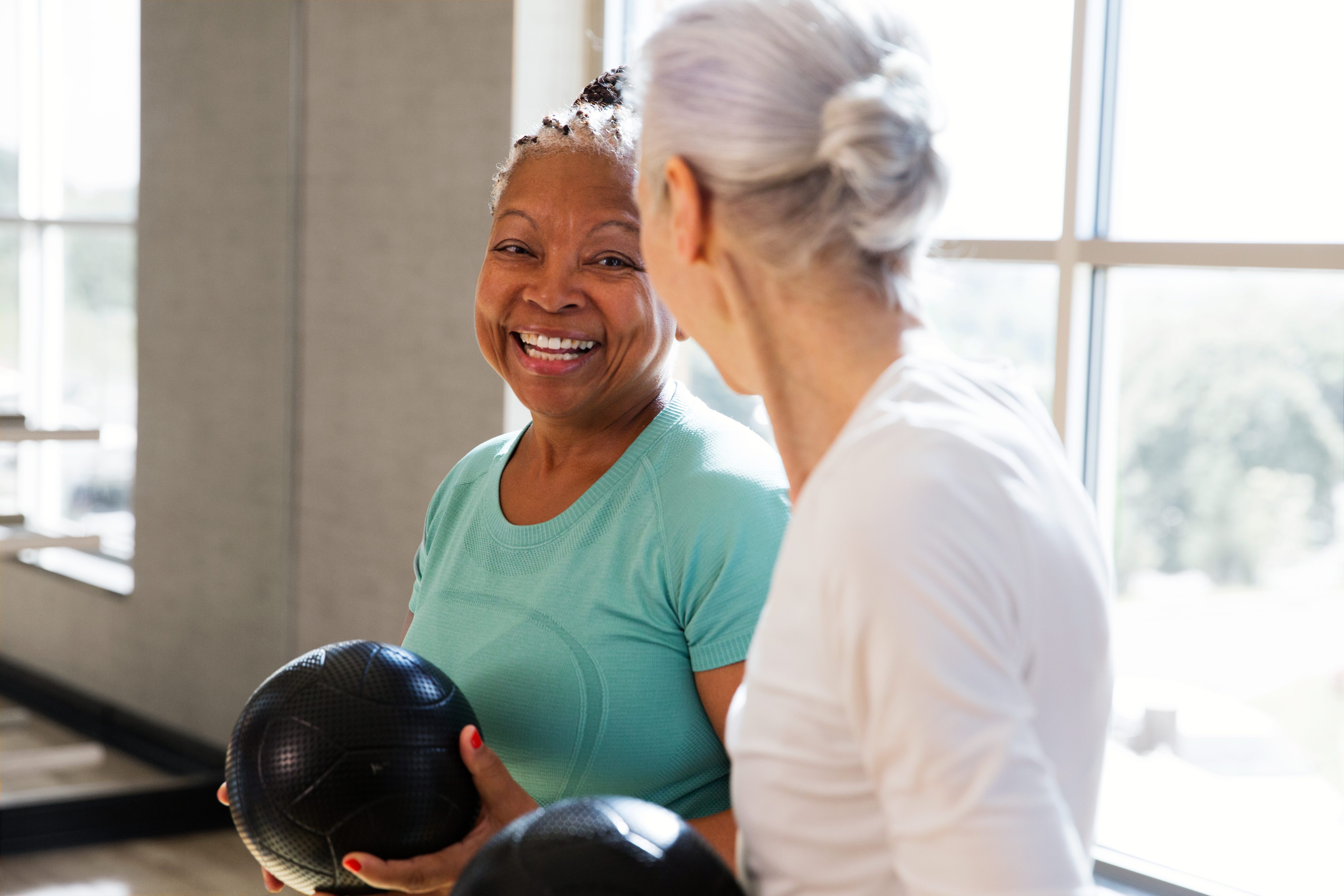 Active-agers participating in a group fitness class.