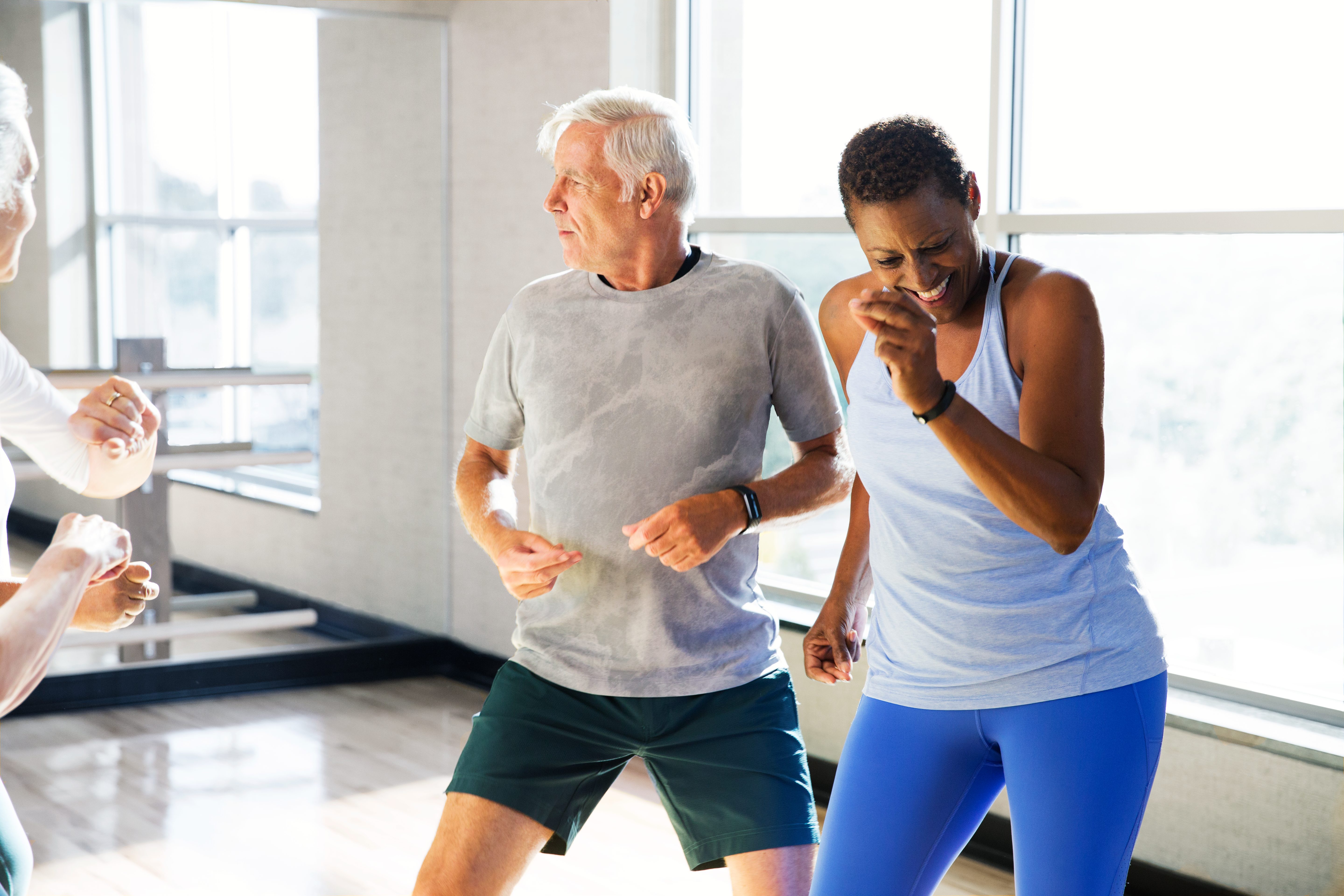 Active-agers participating in a group fitness class.