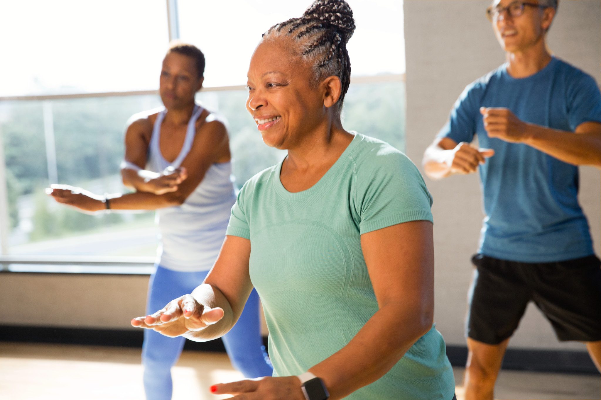 Active-agers participating in a group fitness class.