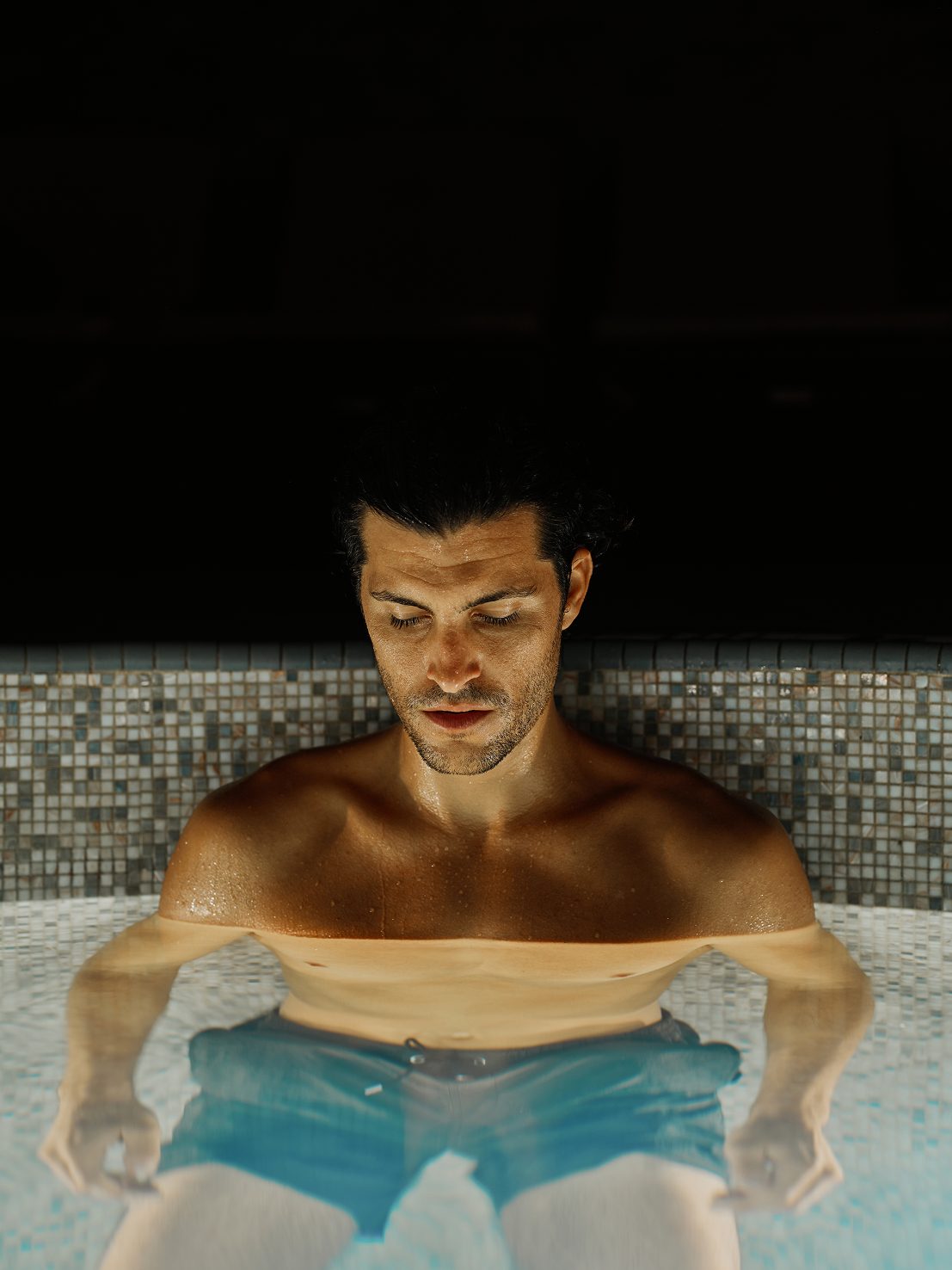 man sitting in water