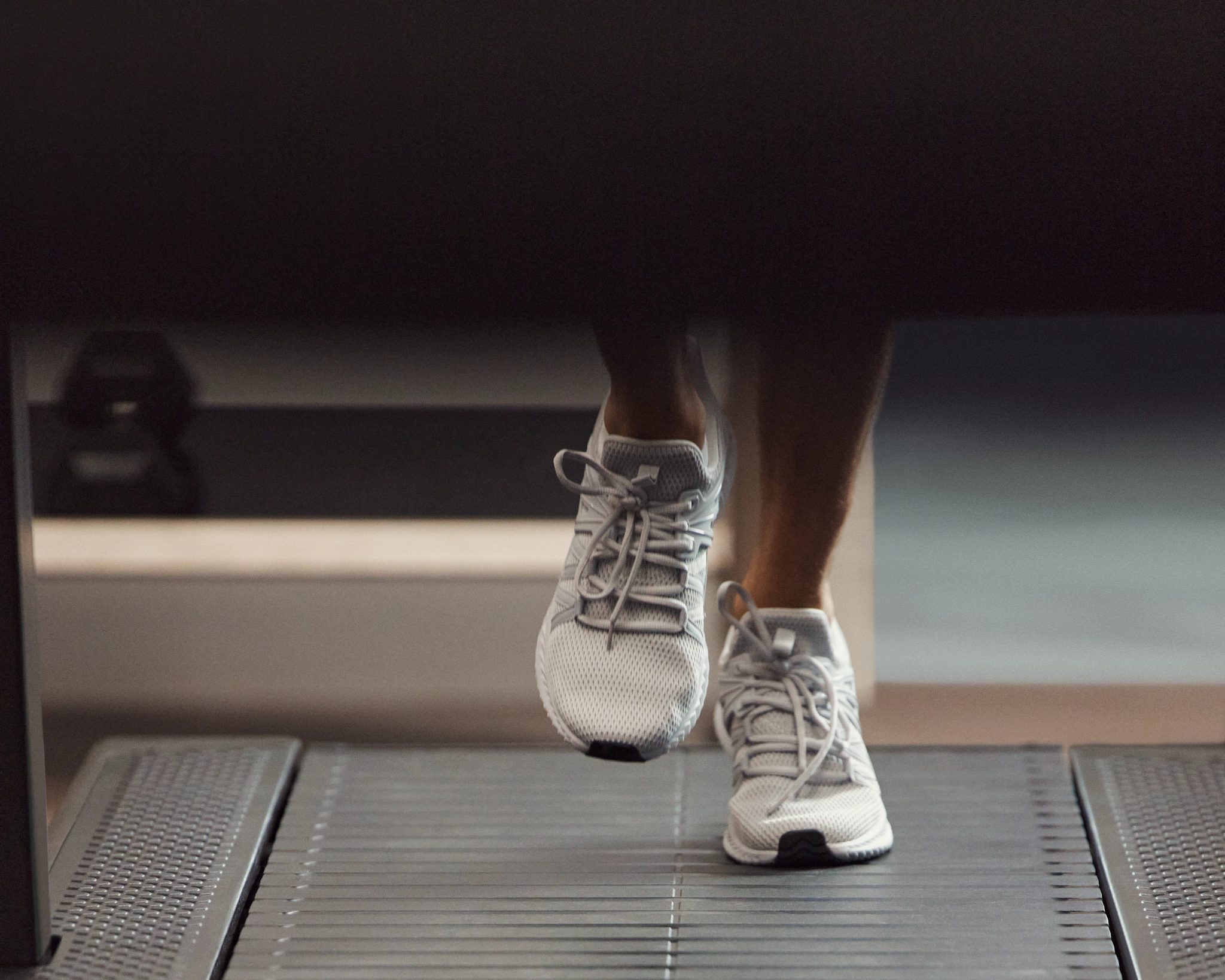 Stylized image of a GTX class member's feet on a treadmill