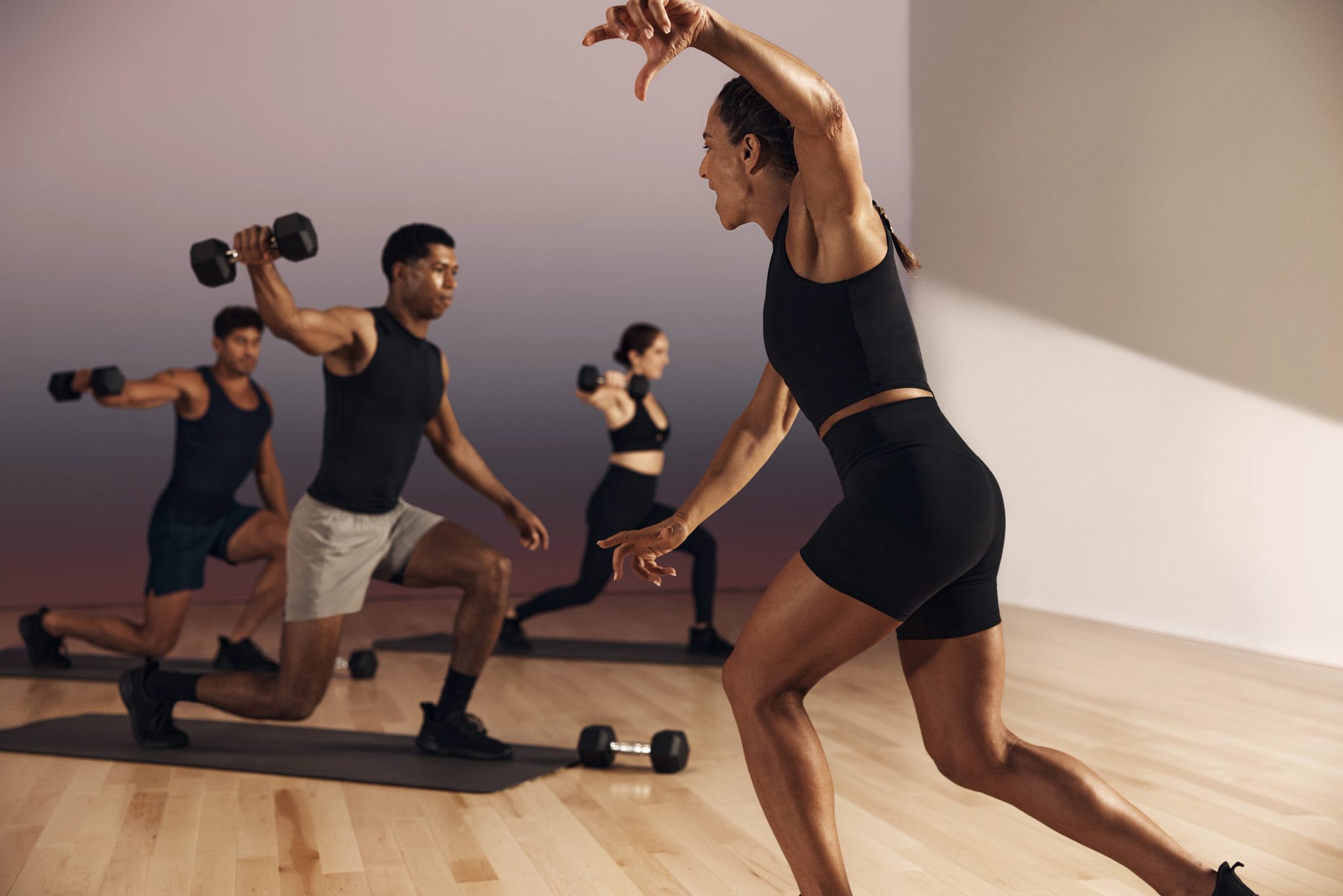 Instructor guiding a Lift strength class