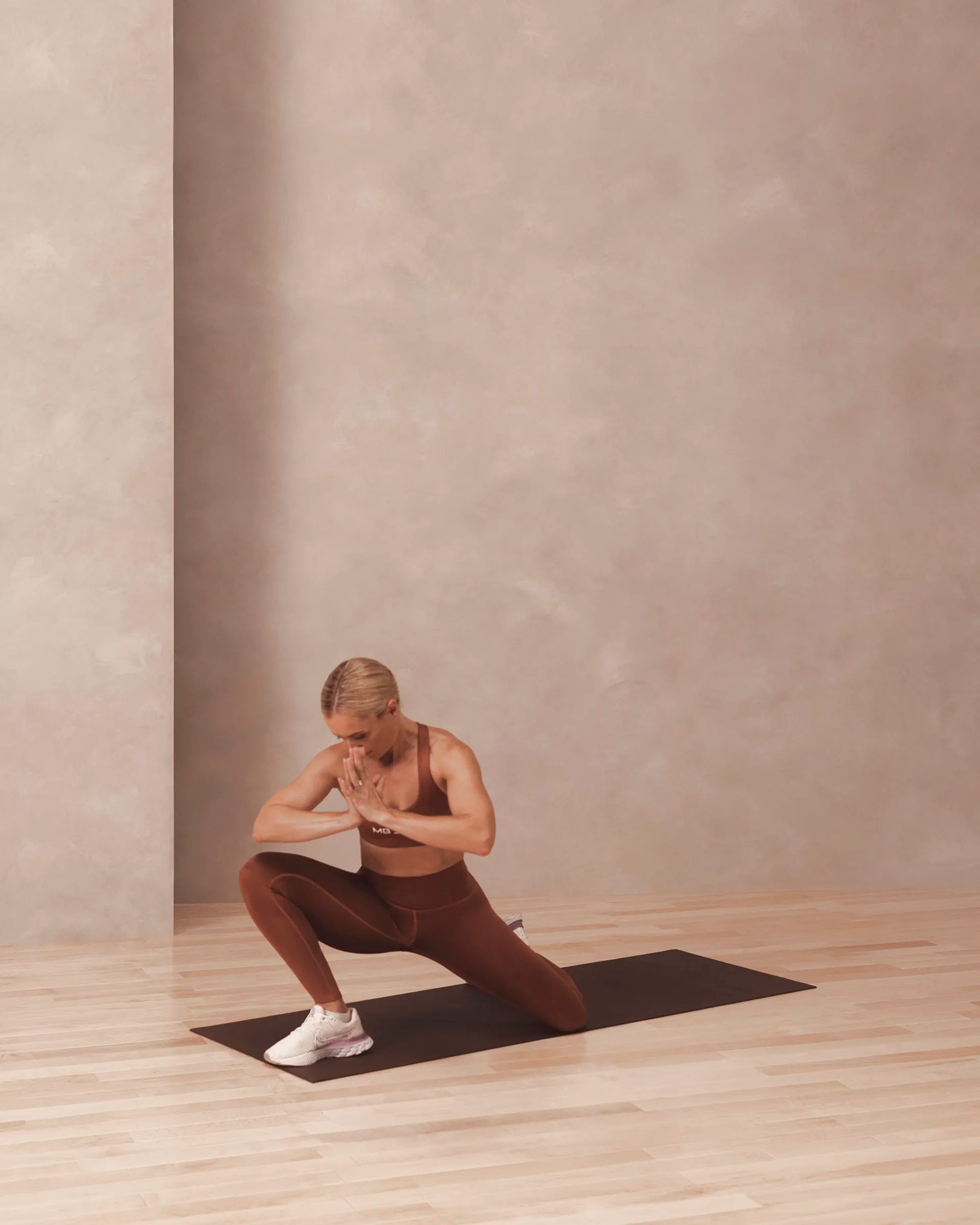 a woman in a shin box and lift position
