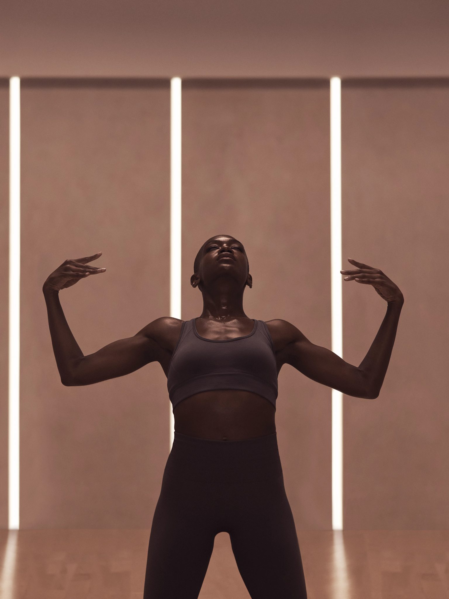 MB360 boutique group training members warming up before the class