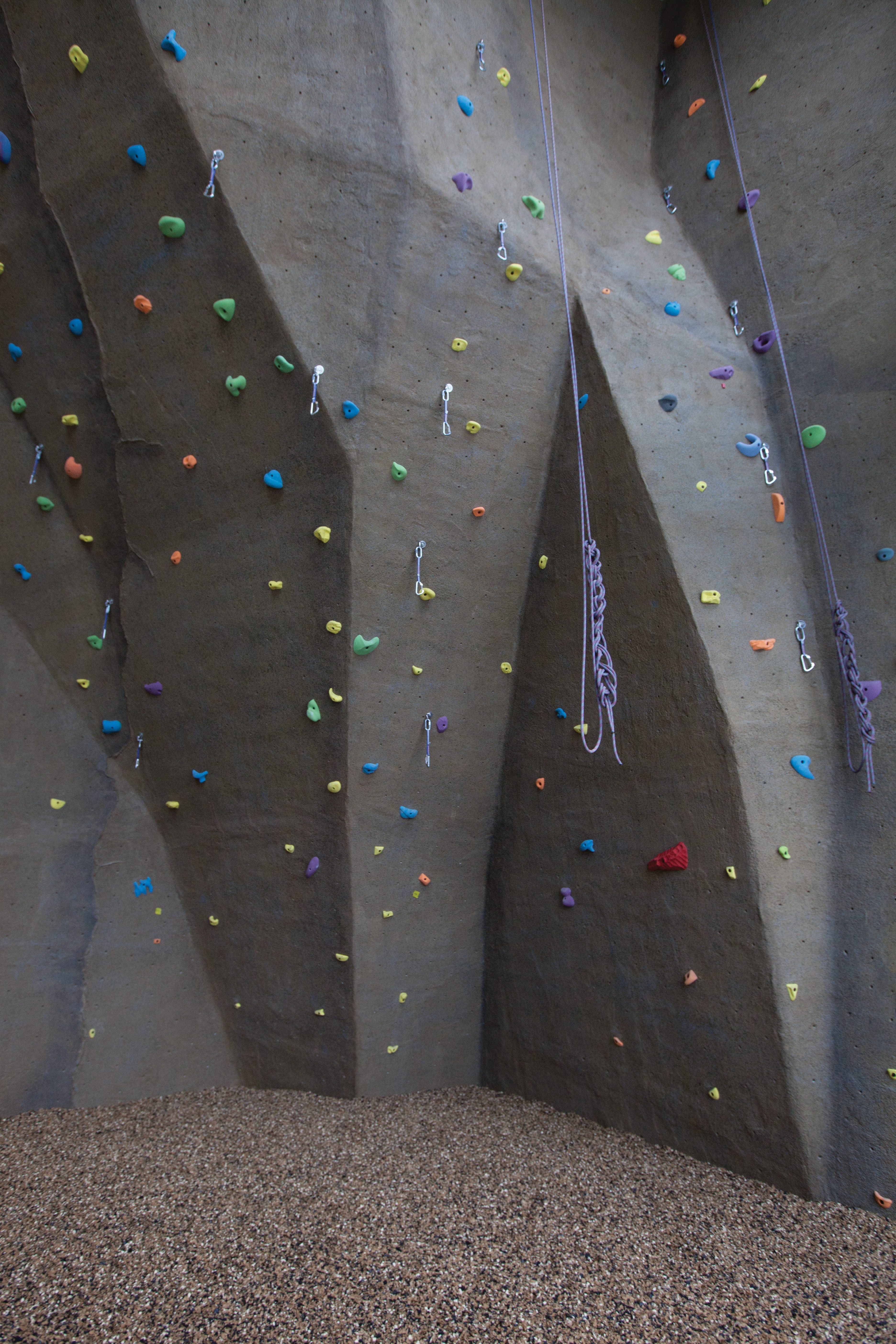 Indoor climbing wall with colorful pegs