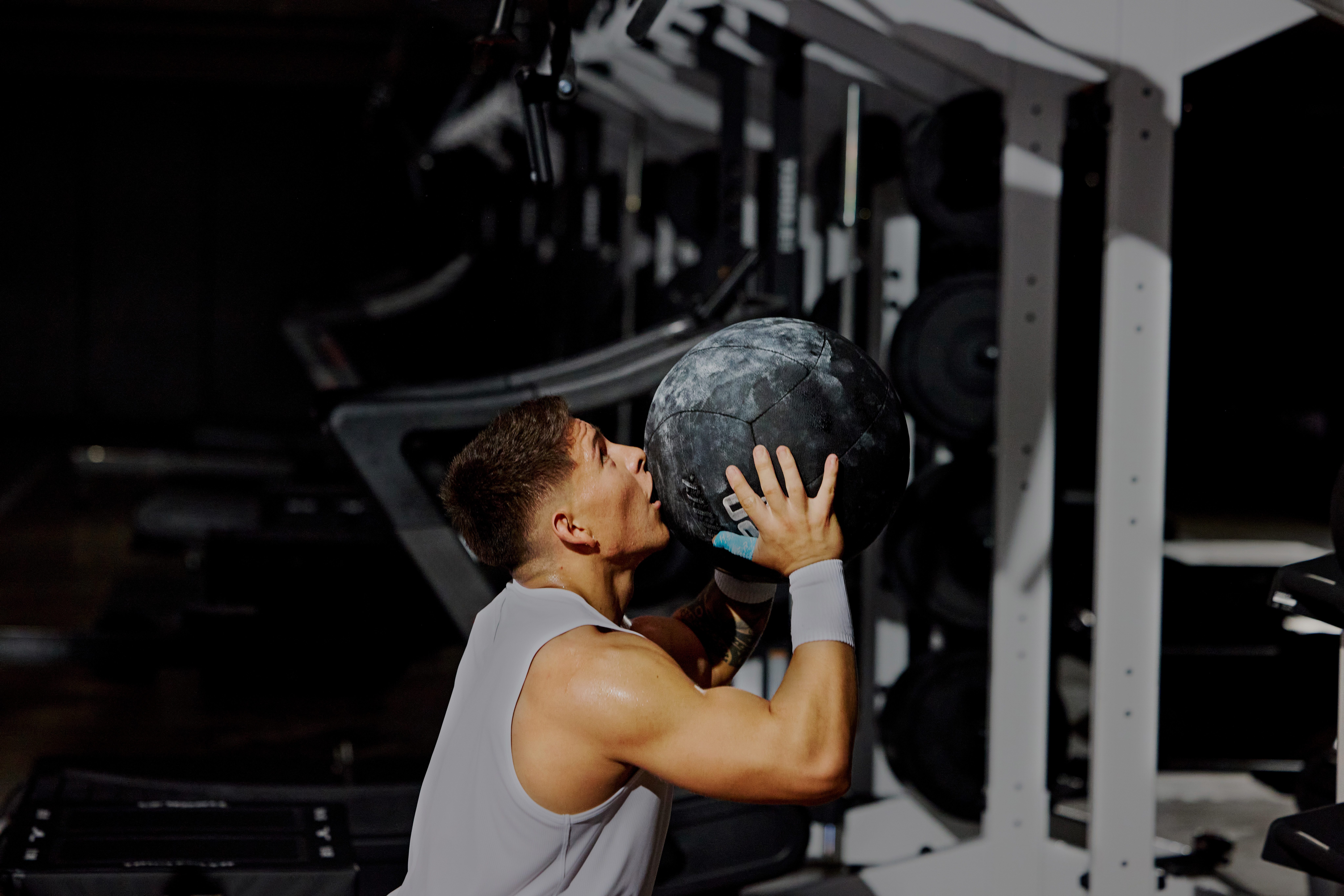 man holding a d ball in his hands