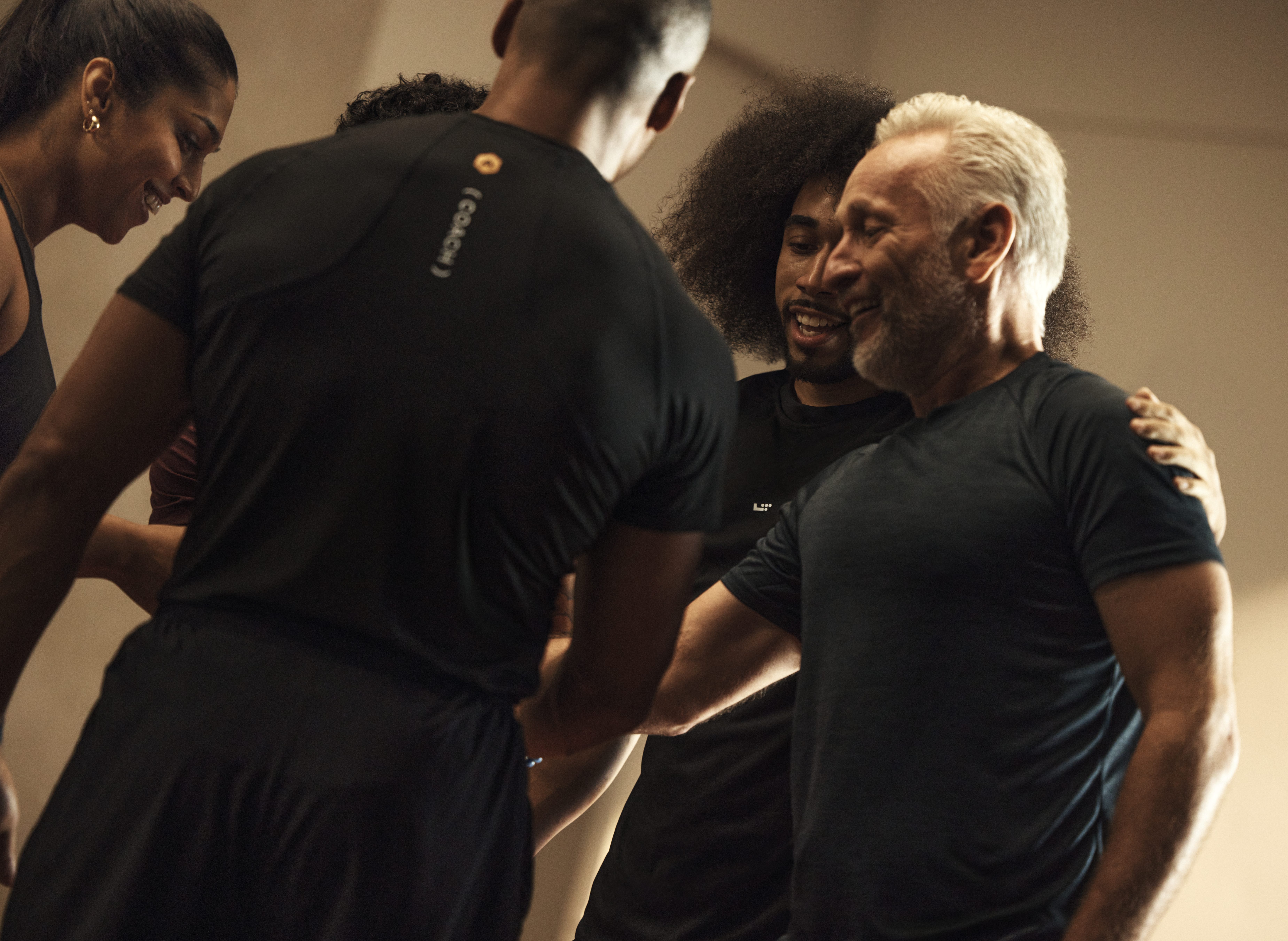 Life Time members talking during a signature group training class