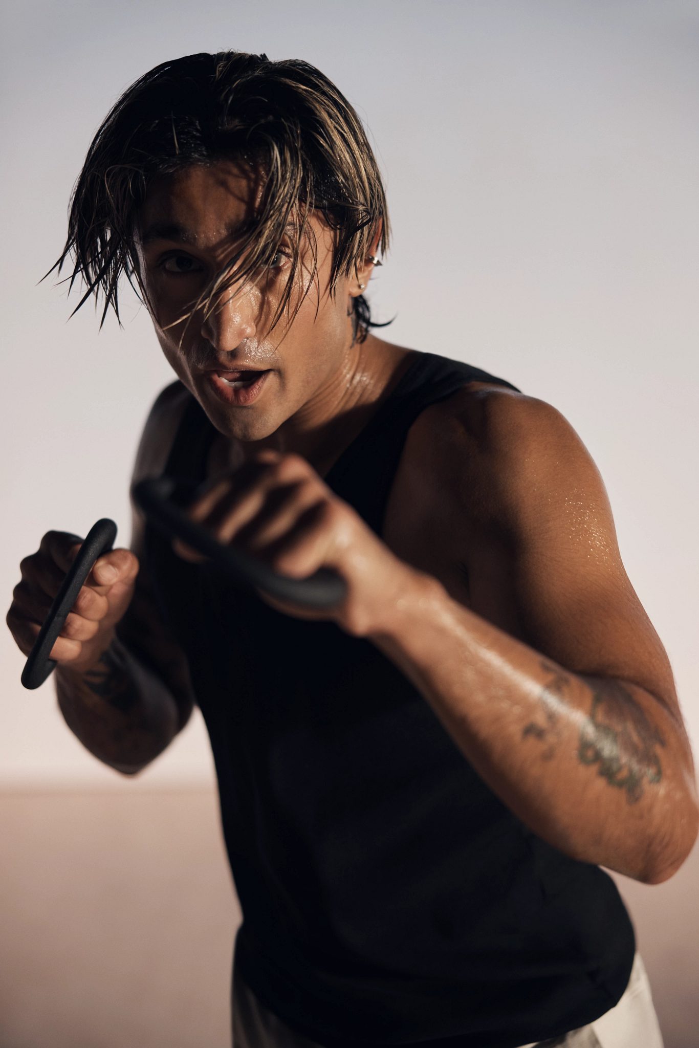 Strike kickboxing martial arts class participant in ready stance at Life Time