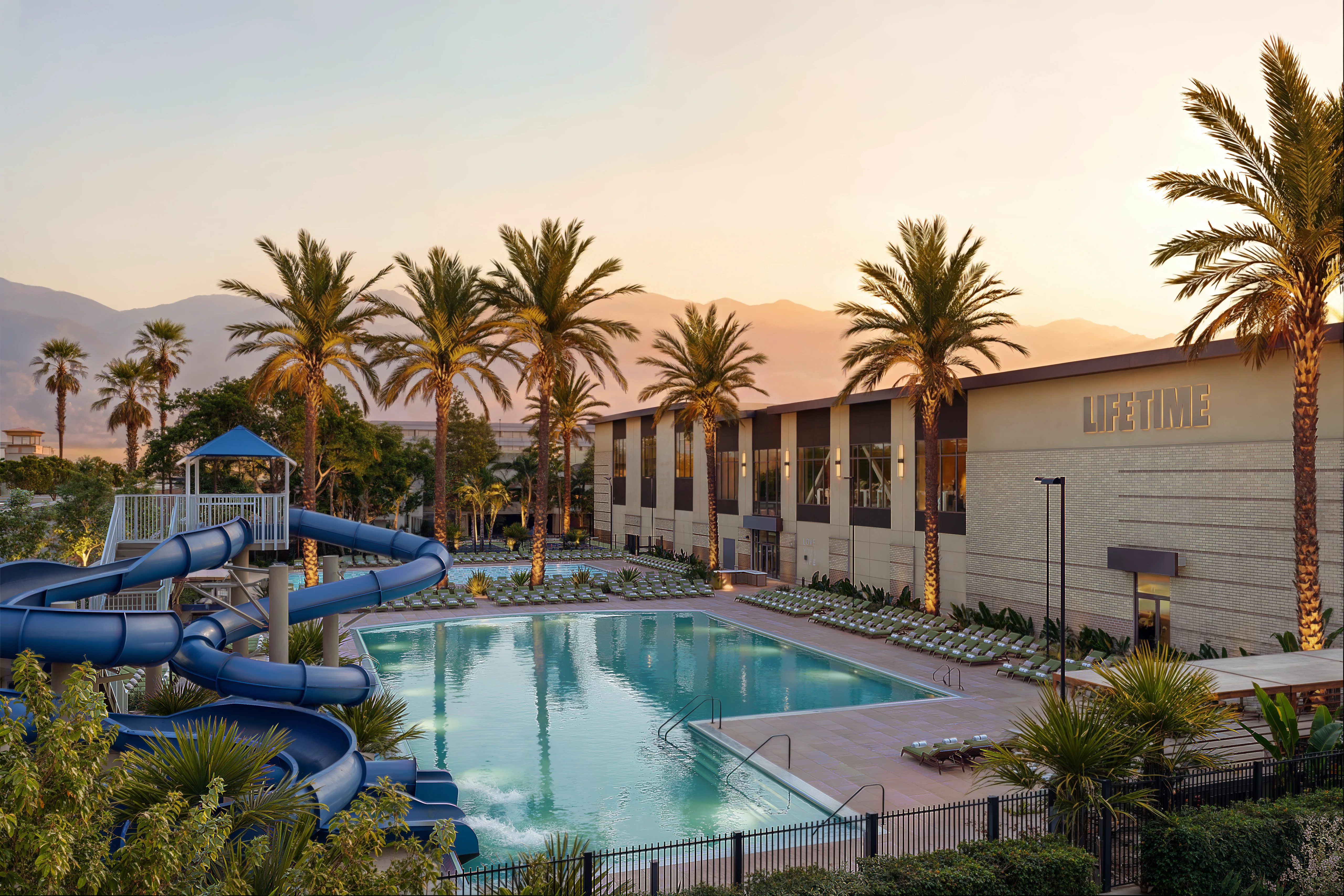 outdoor pool and waterslides at Life Time Brea