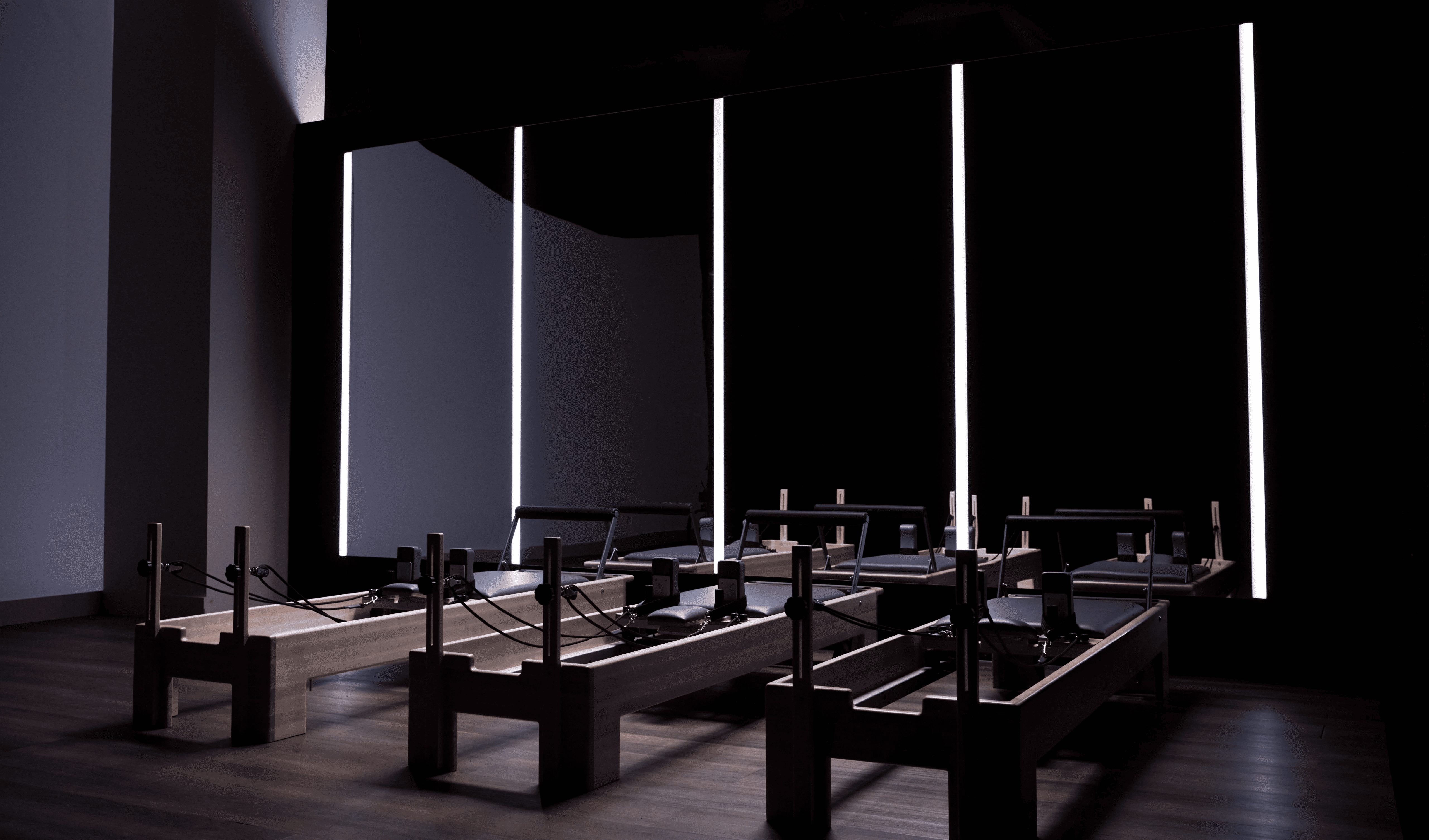 a row of pilates machines