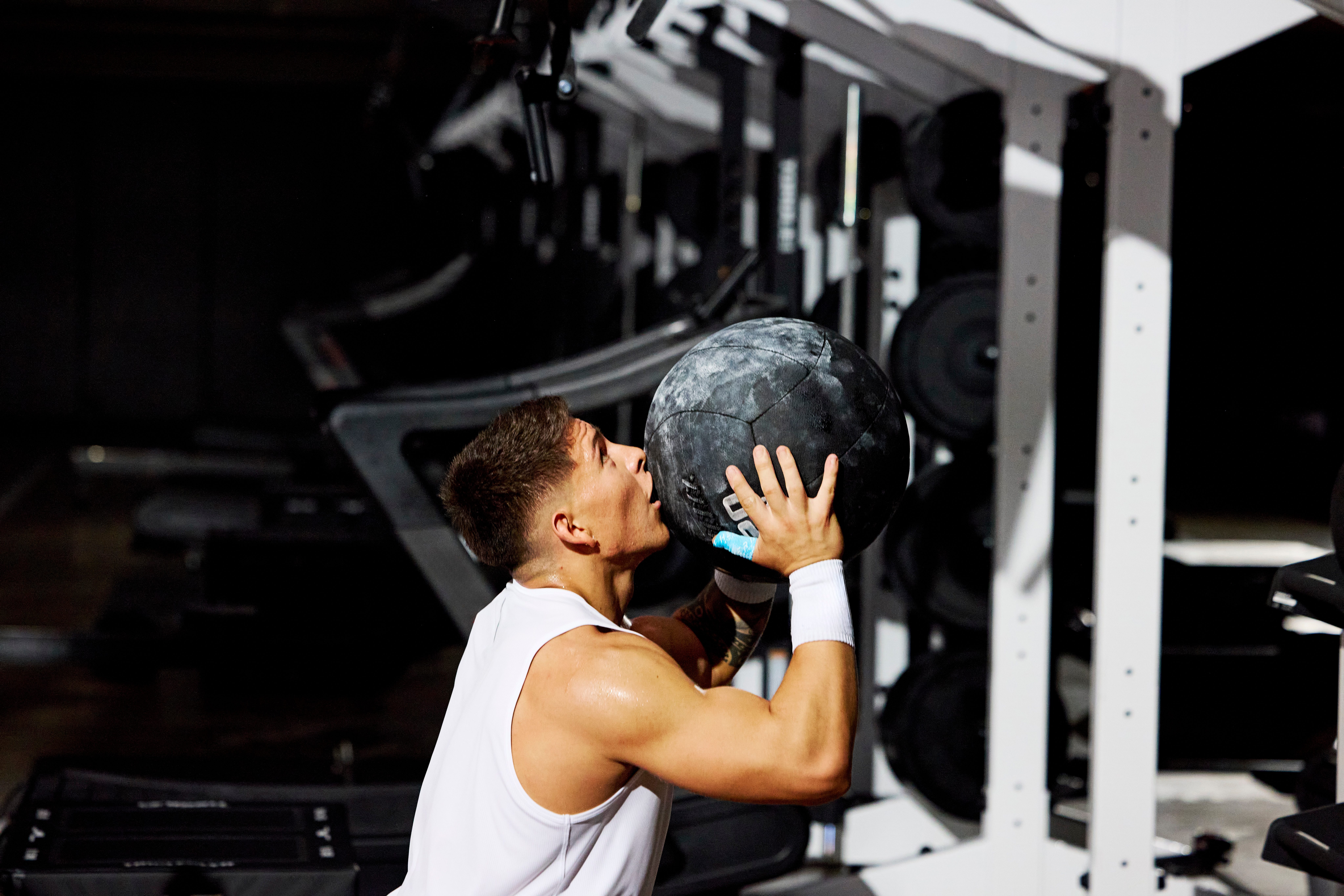 man holding a medicine ball