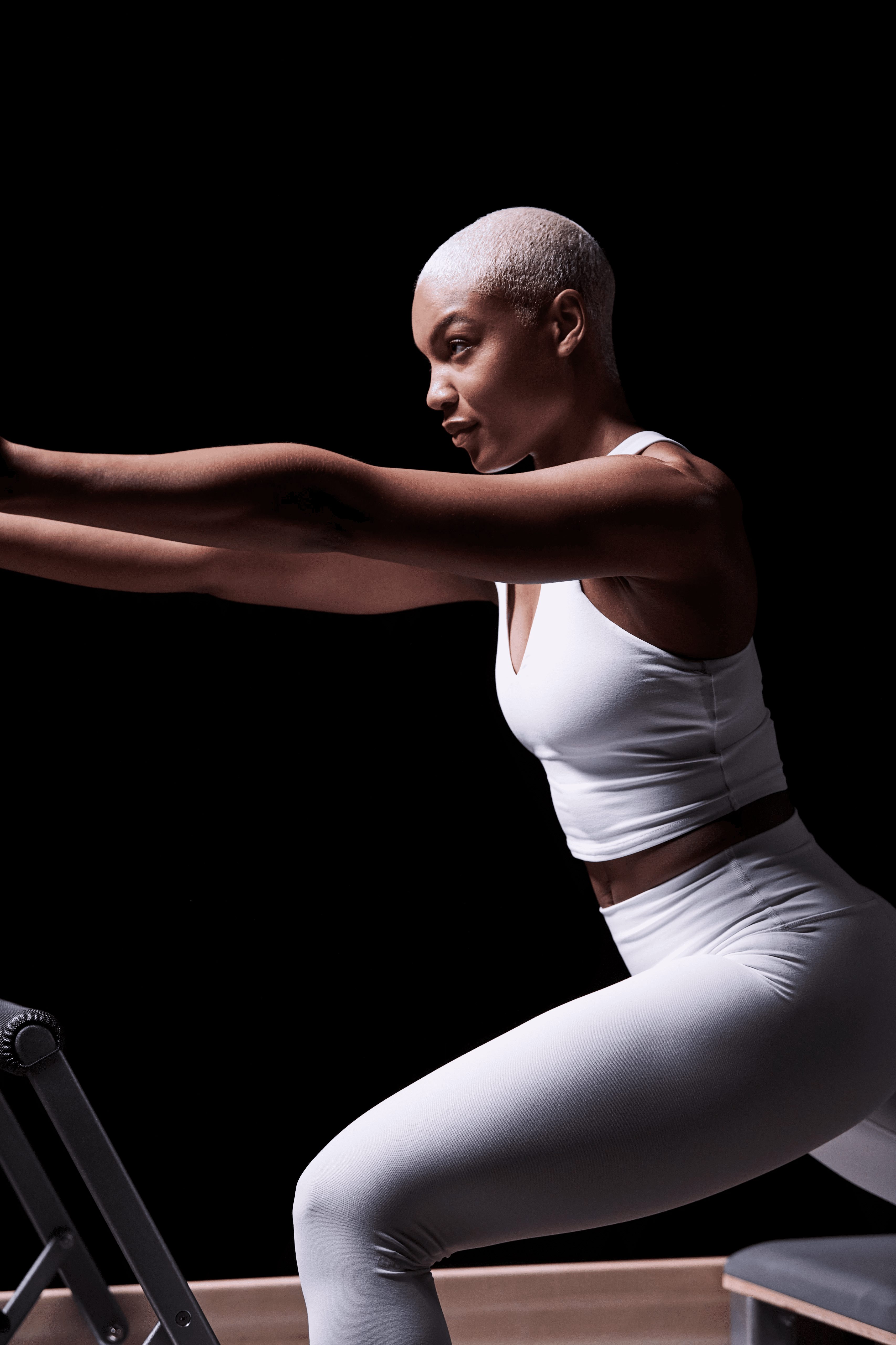 woman in white workout clothes