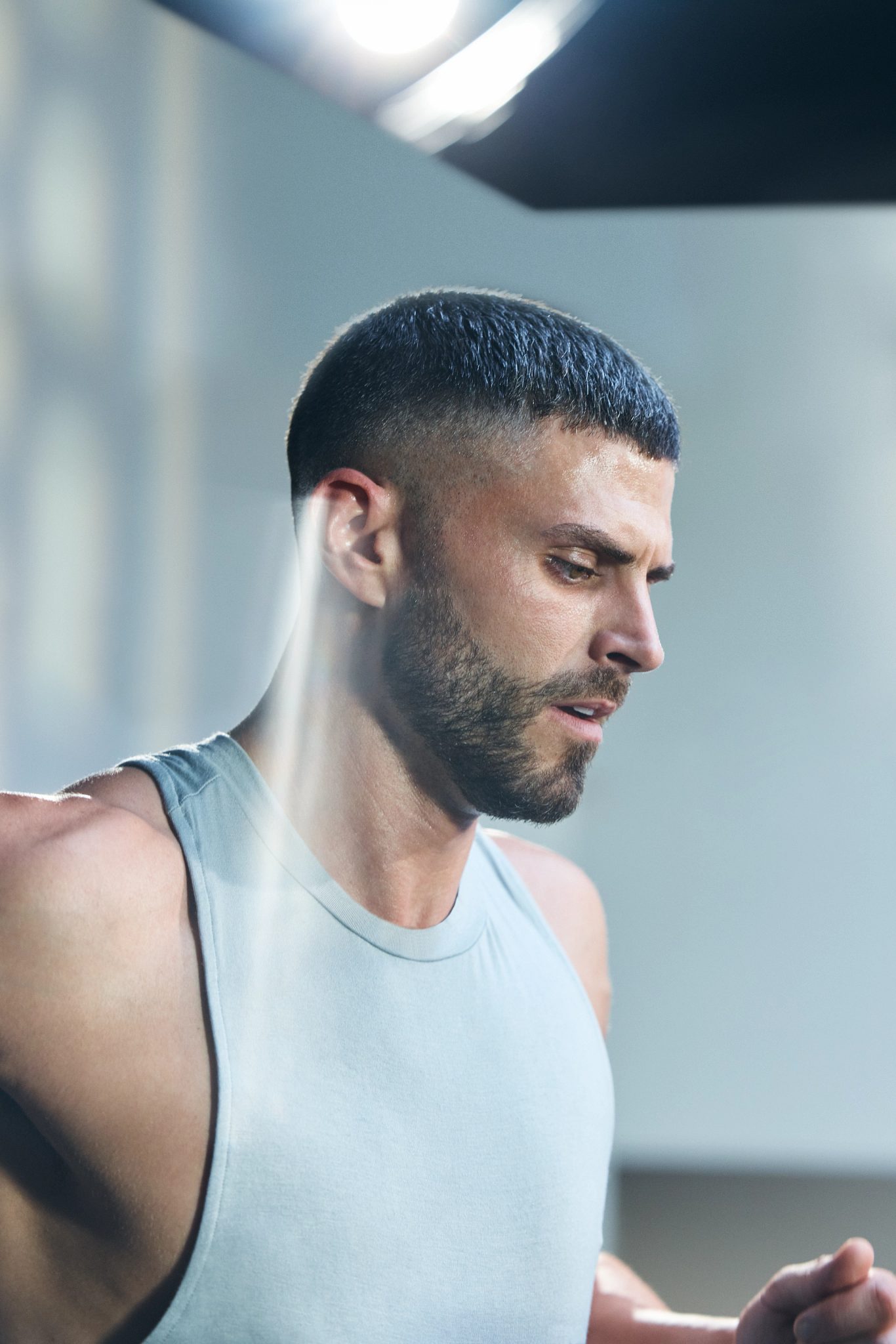 man wearing a gray workout shirt