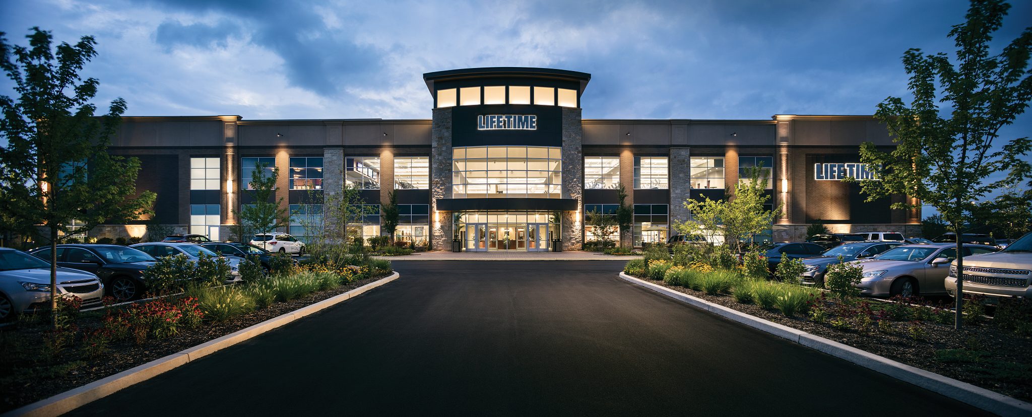 The exterior of the Fort Washington Life Time location at dusk