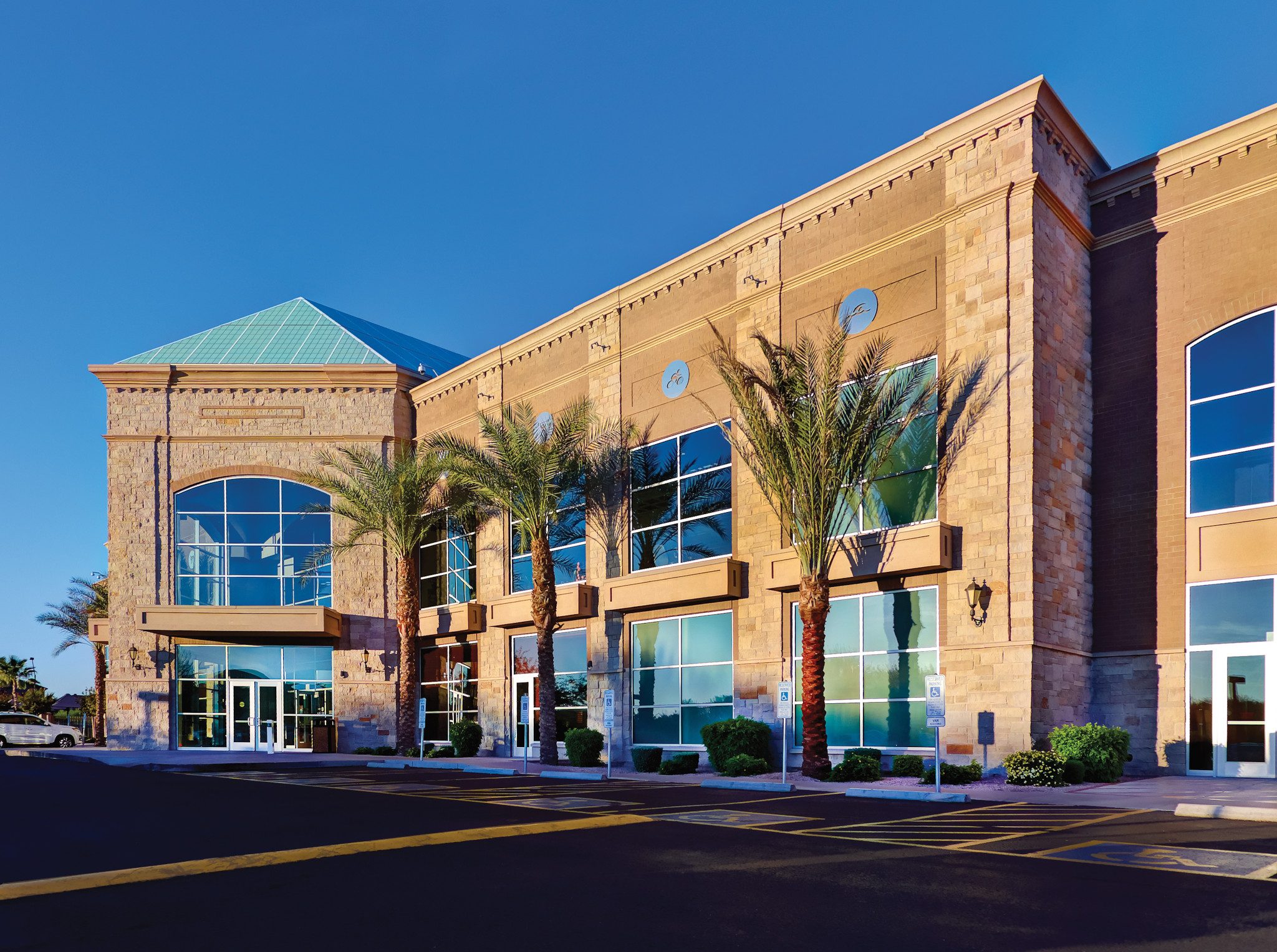 The exterior and front enterance of a Life Time location