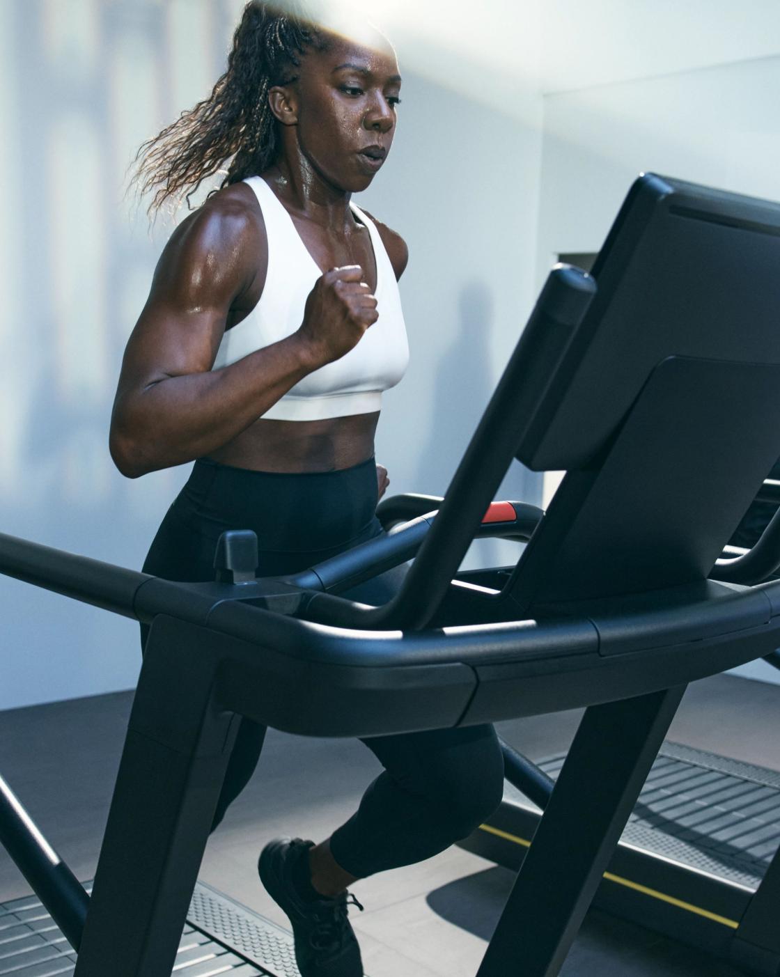 woman running on a treadmill