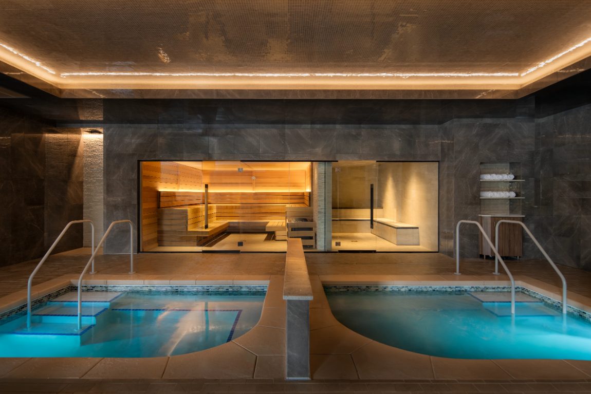 A spa suite with cold plunge, sauna and steam room