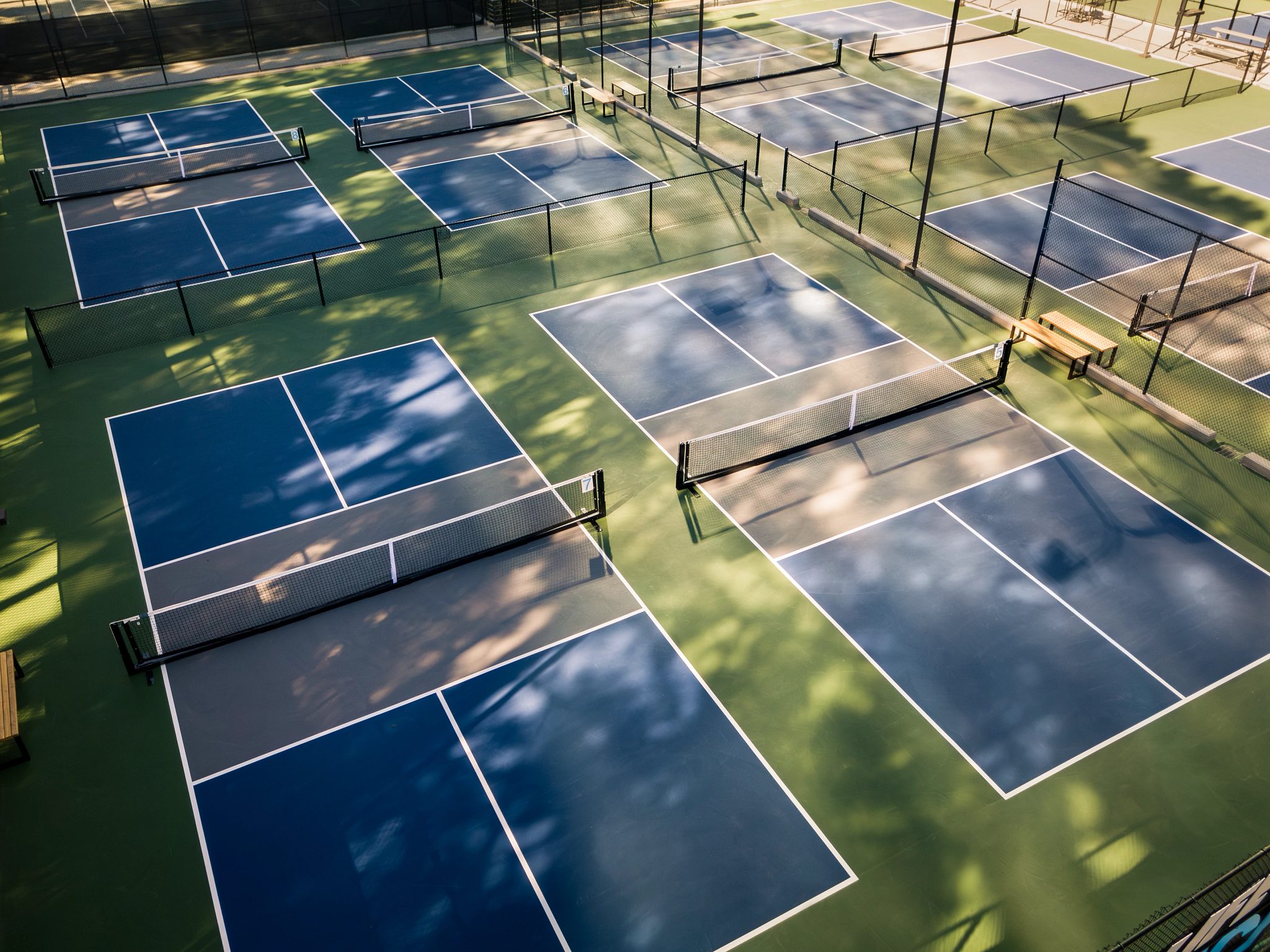 Outdoor pickleball courts at the Life Time Perimeter club location