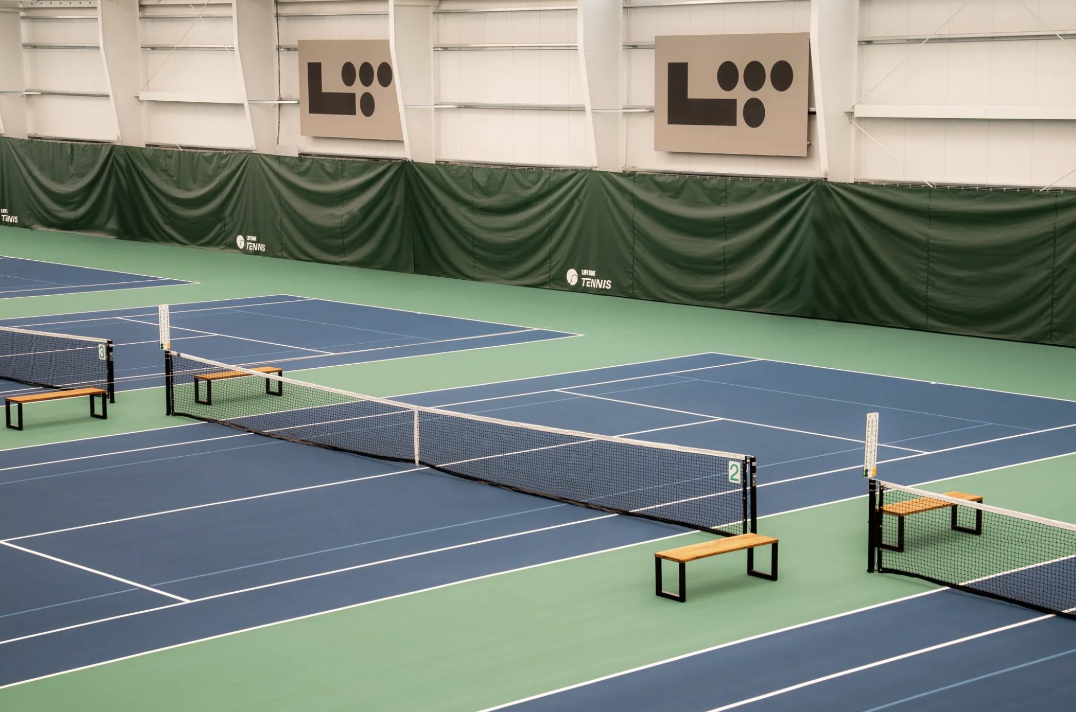 tennis courts, showcasing several courts at Life Time