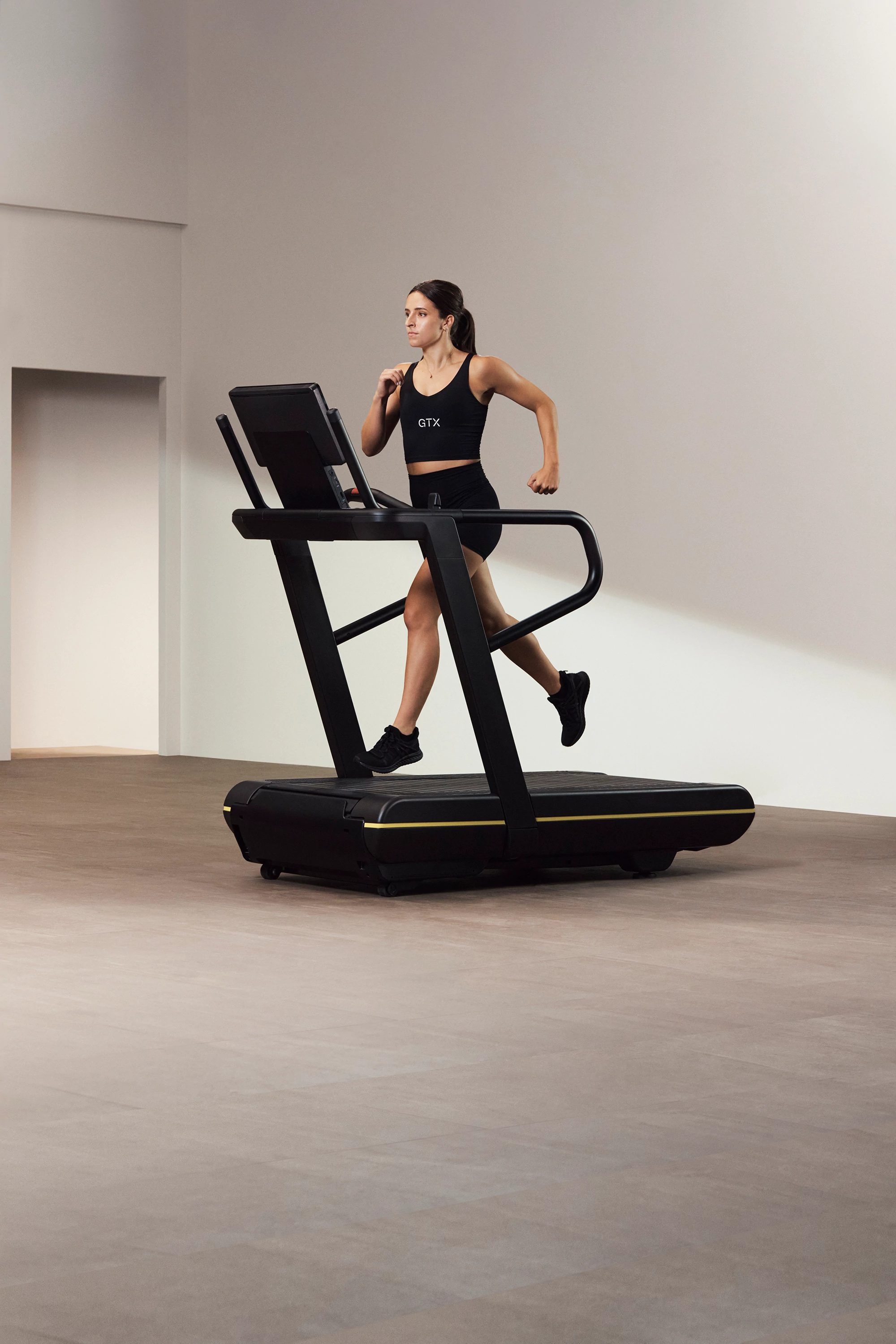 woman running on a treadmill