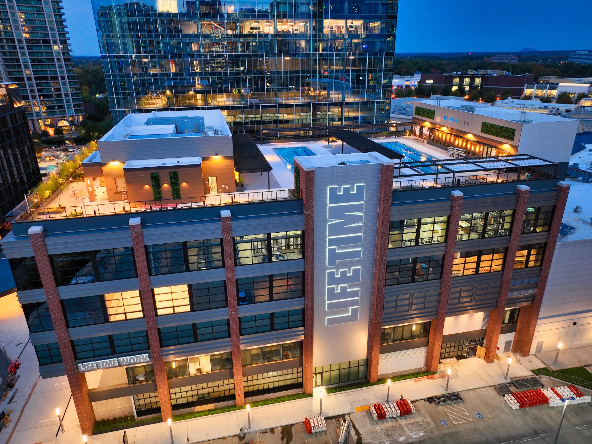 An aerial view of Life Time Buckhead at Phipps Plaza at night