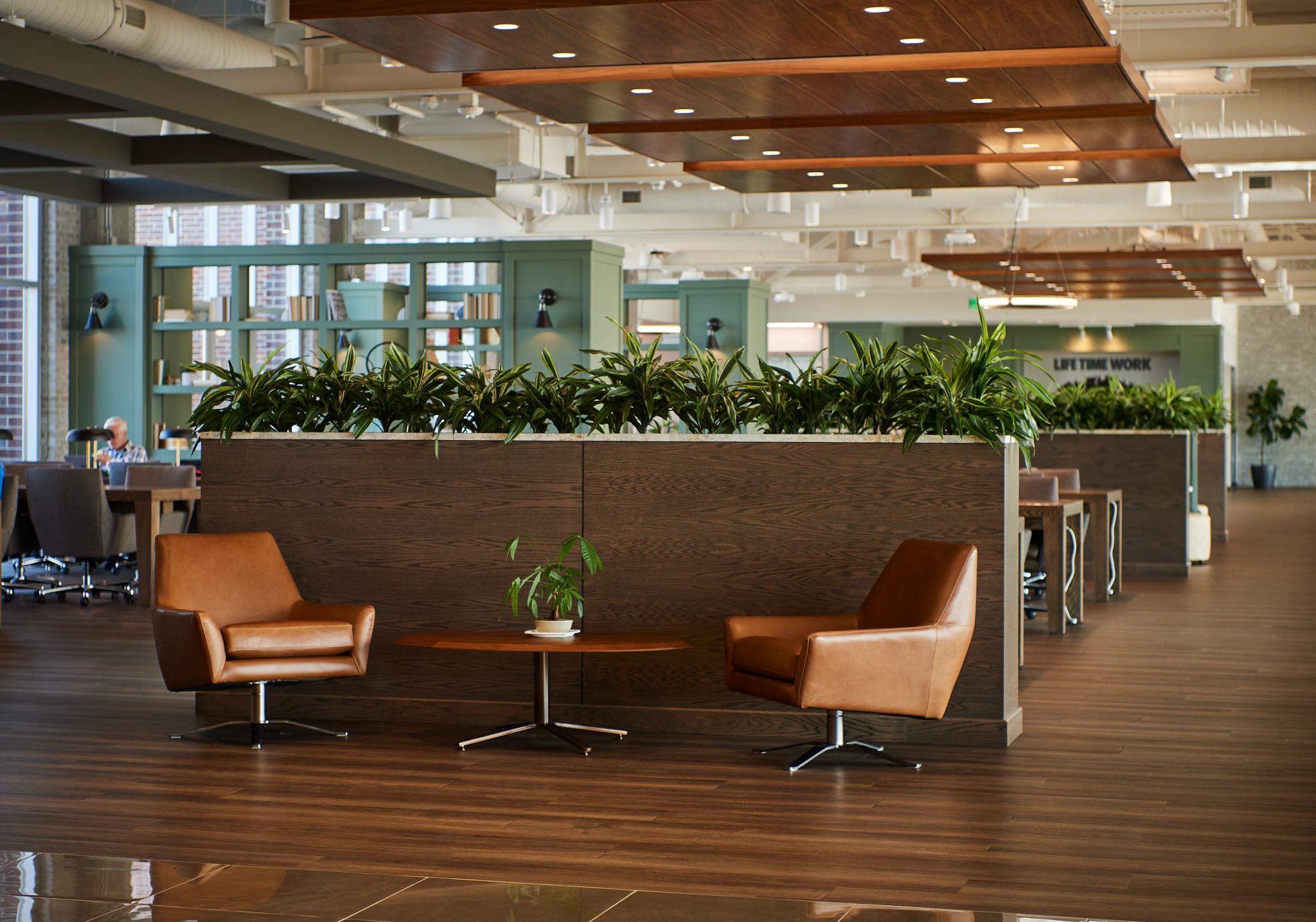 A small seating area amongst coworking areas at Life Time Work