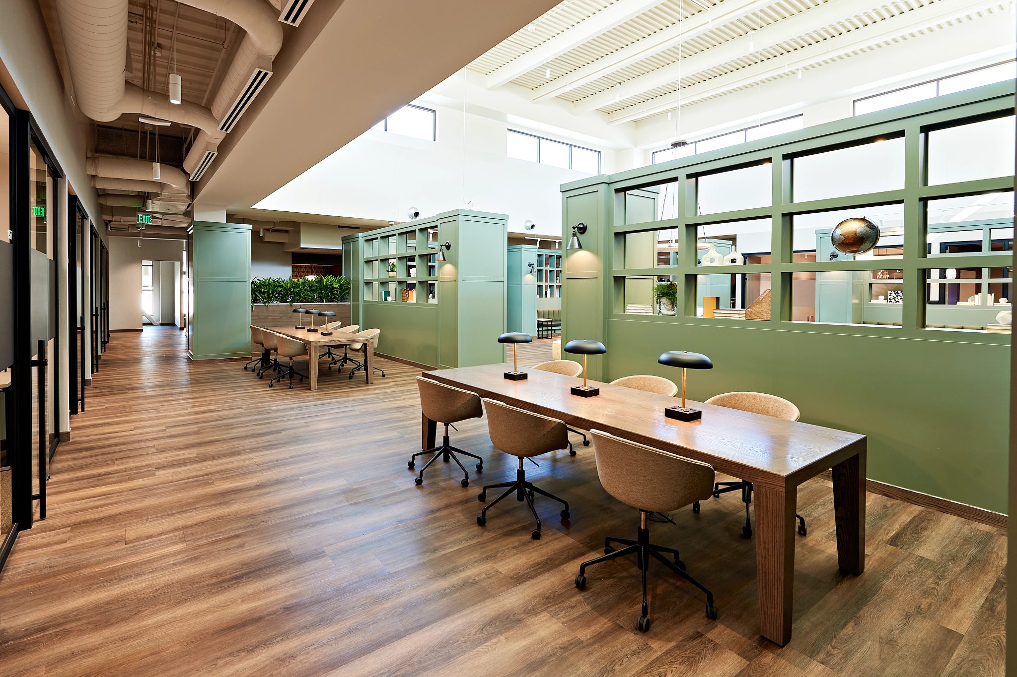 Coworking tables with seating in a warm work environment
