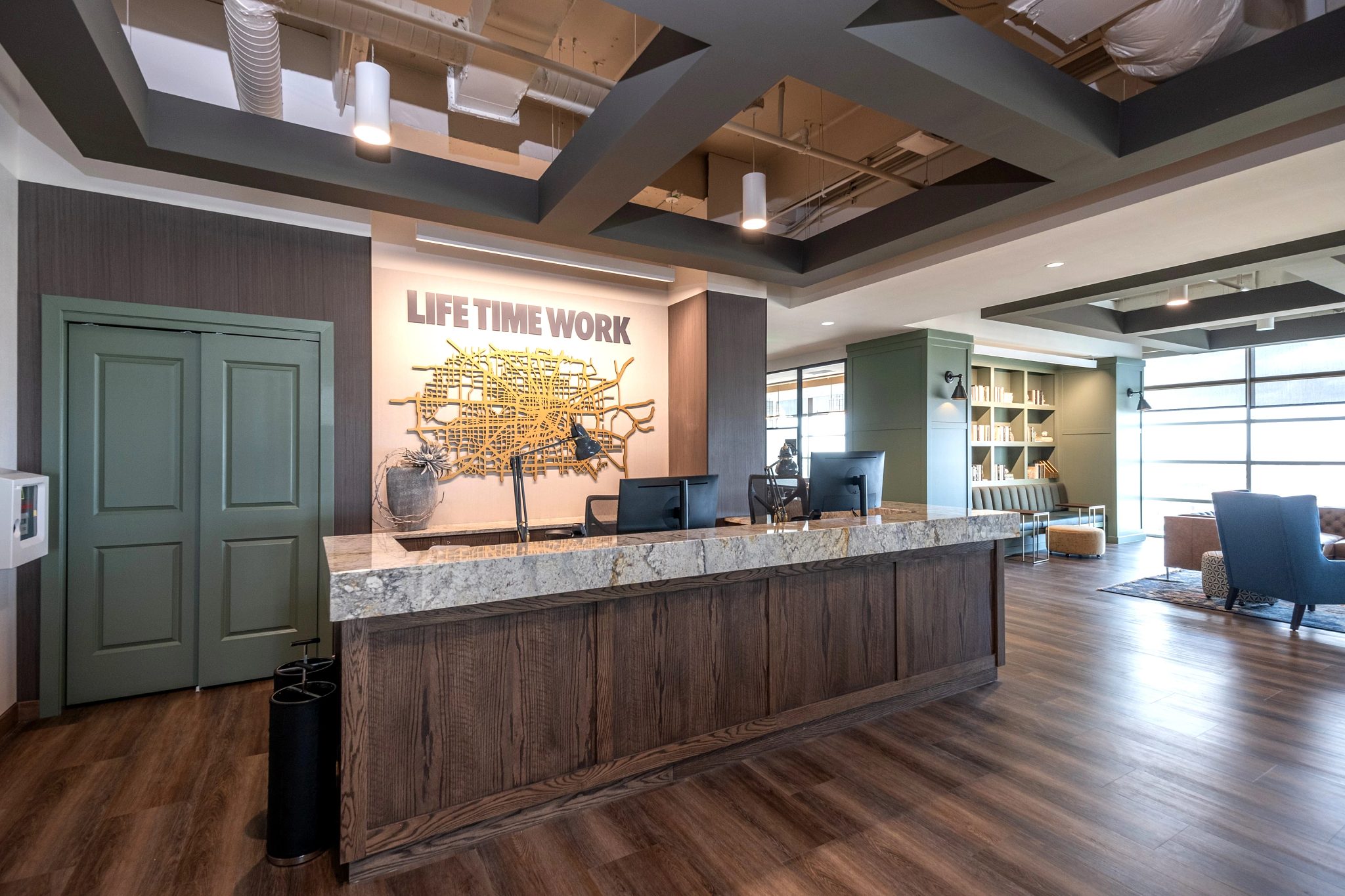 Reception desk and entry at Life Time Work City Centre Houston