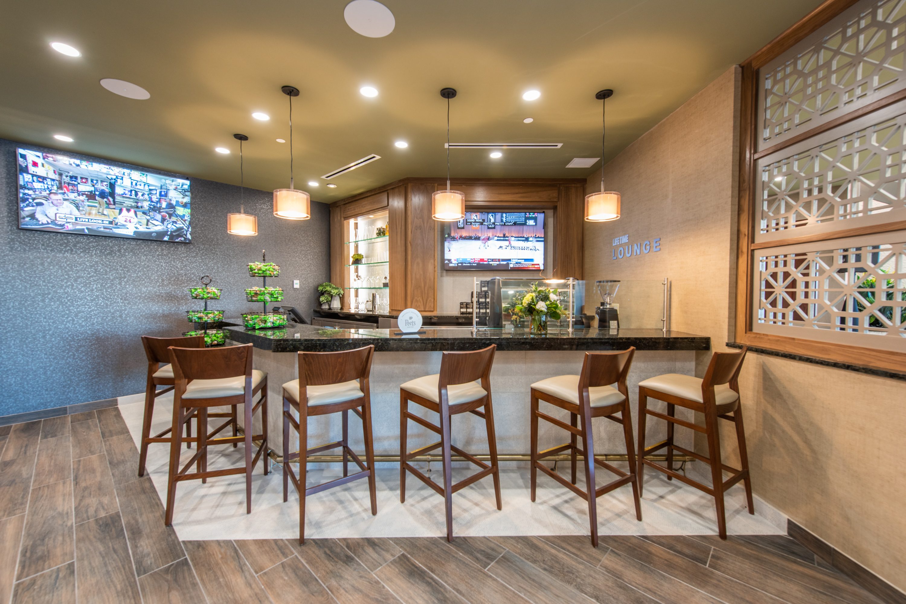 chairs around a bar area