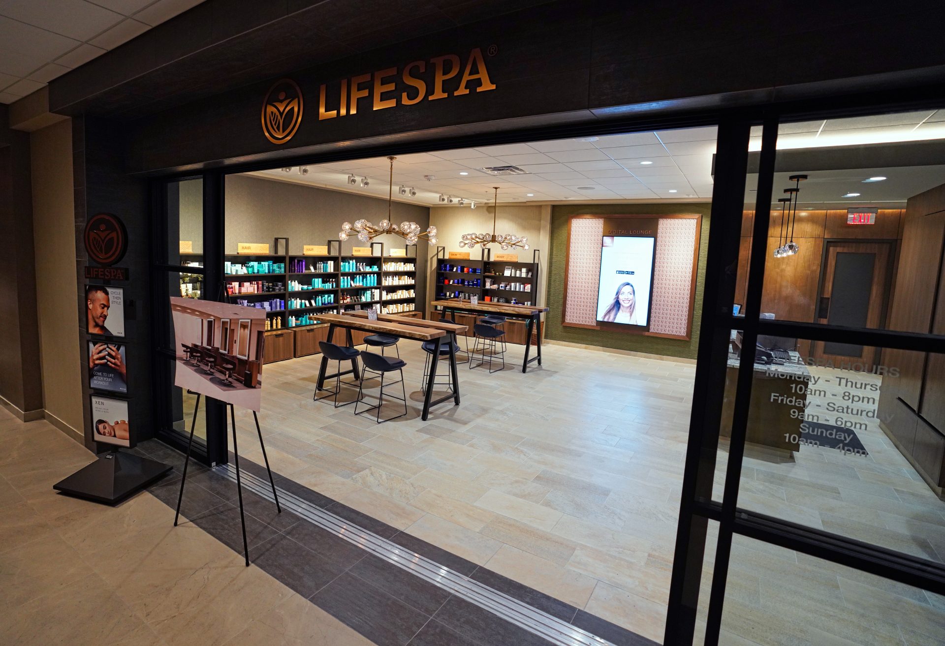 The entryway of the Lifespa, with tables and chairs, and products for sale