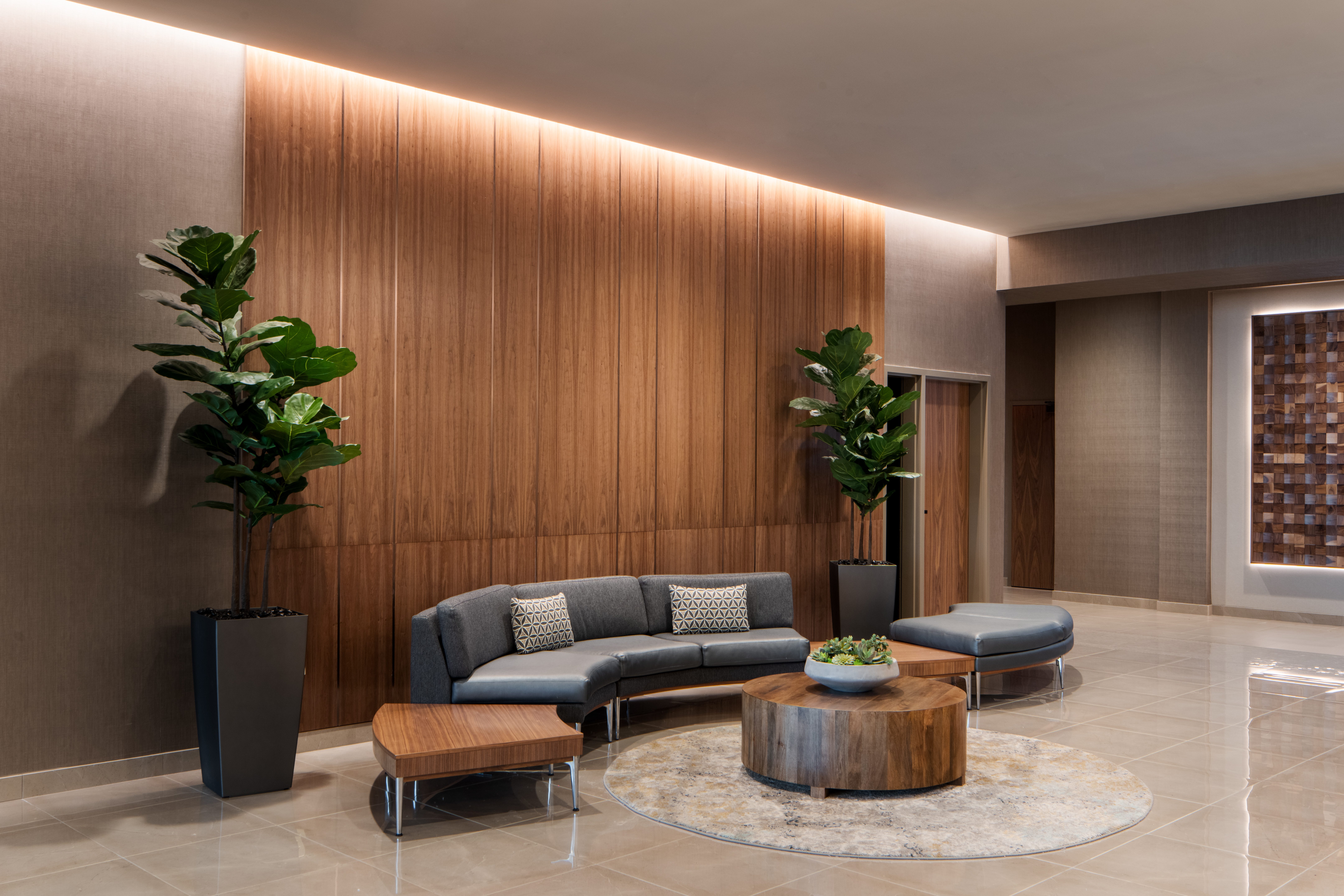 Lounge seating area with couches at Life Time Buckhead