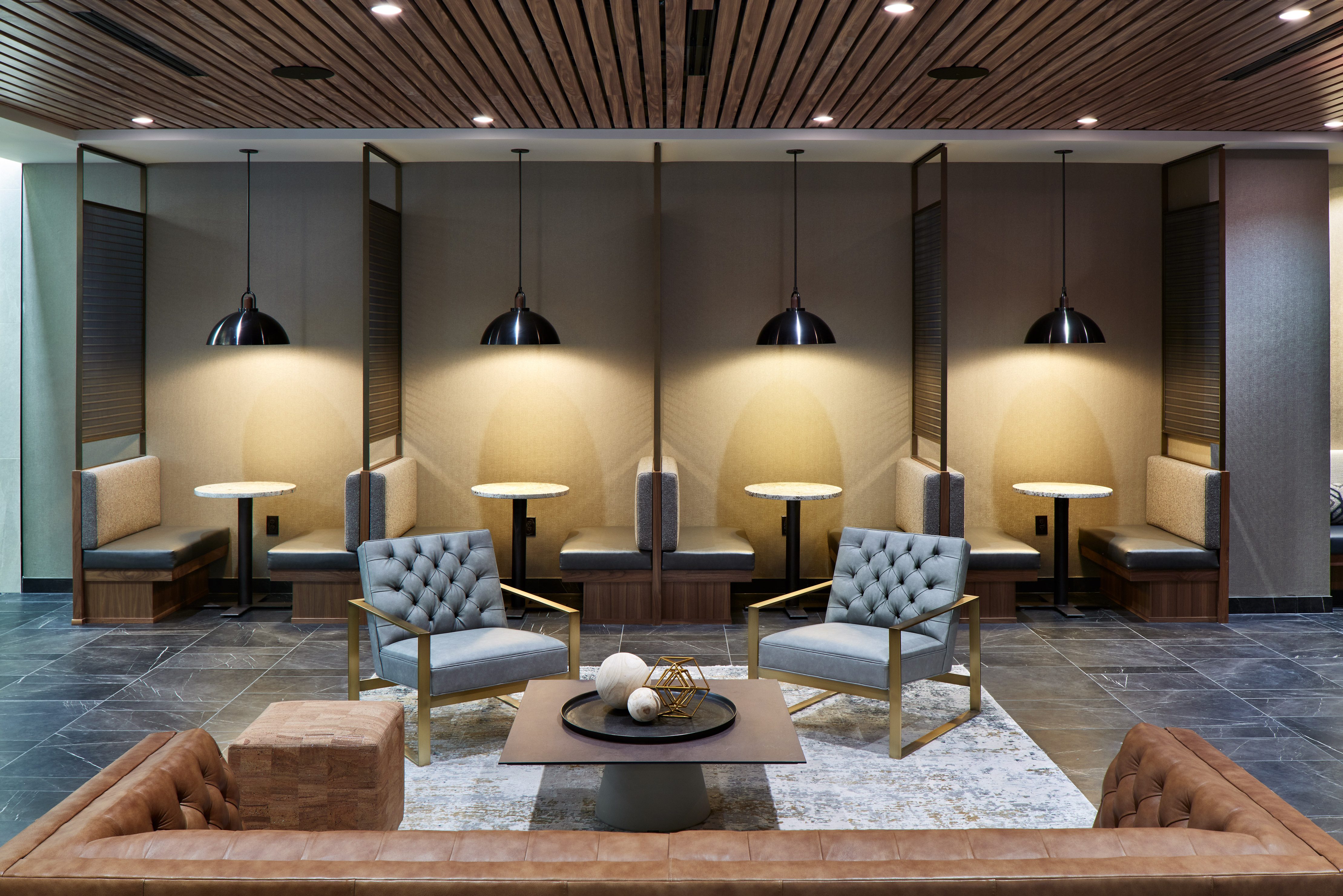 Lounge area with couches and boothes