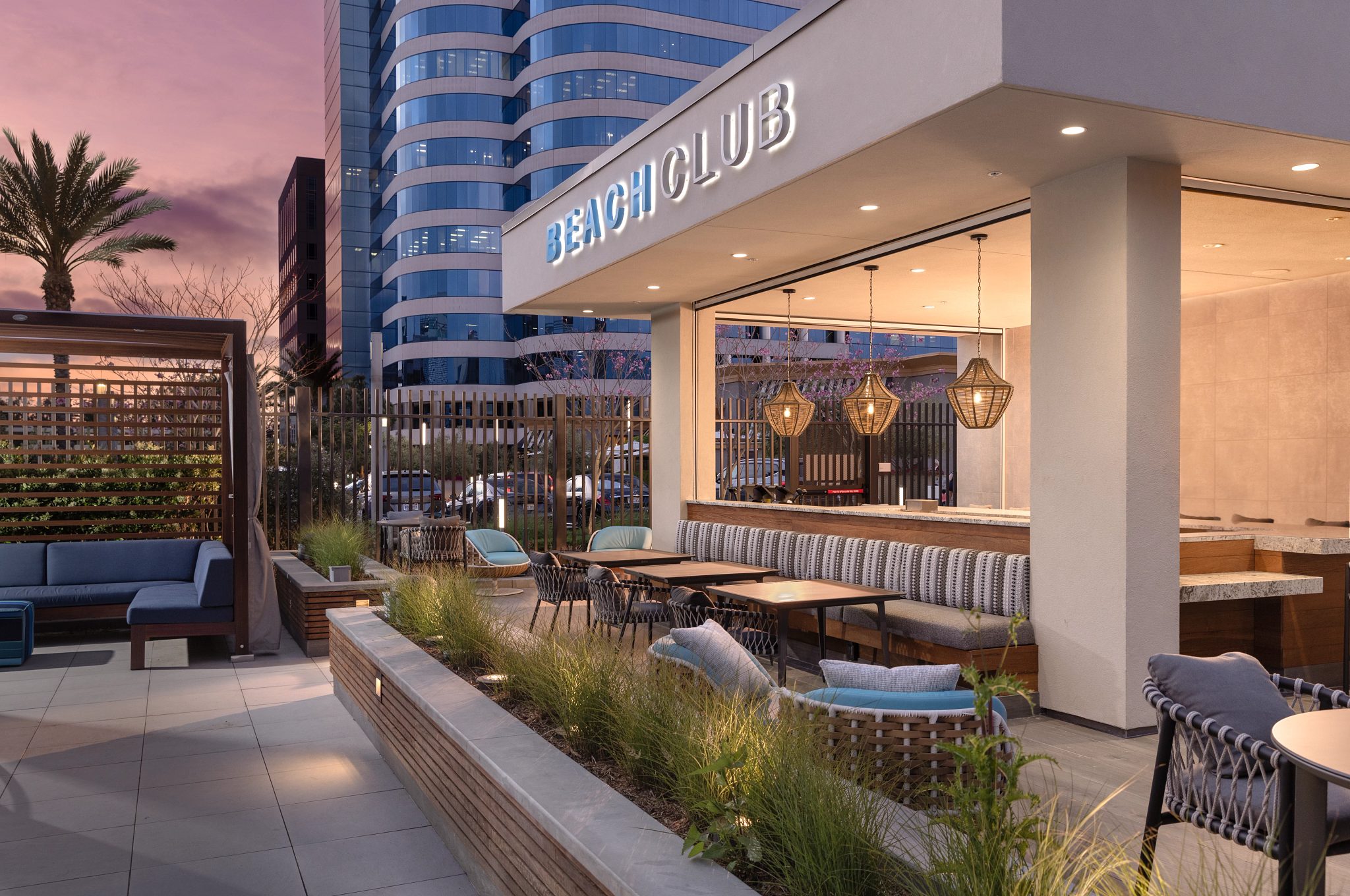 Outdoor poolside Beach Club at the LIfe Time Lakeshore Irvine club location