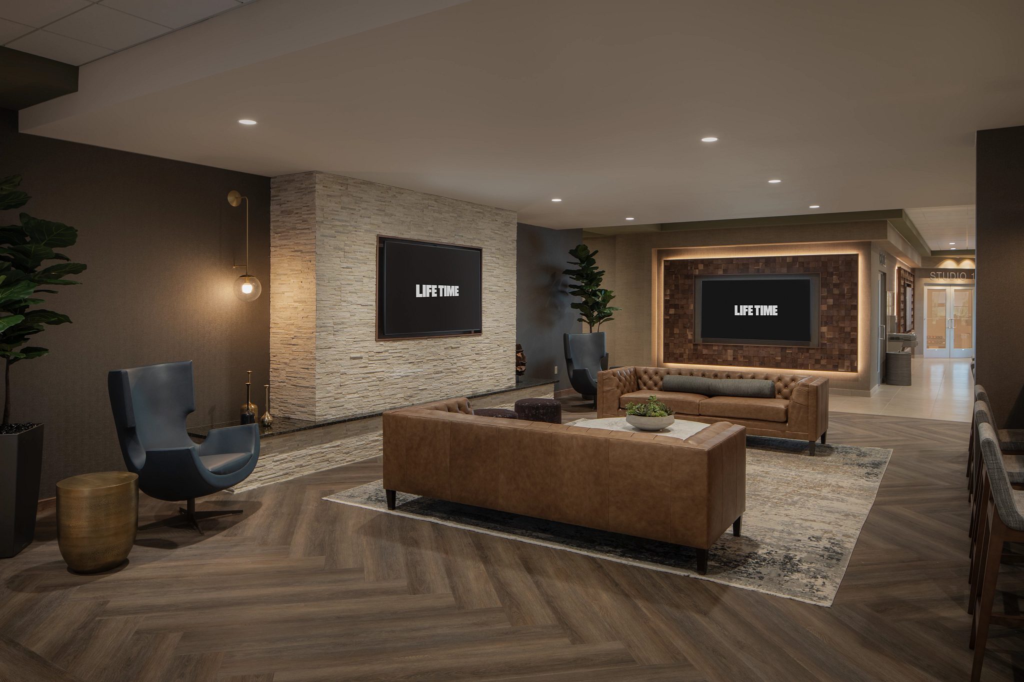 Couches and T.V.s in a sitting area