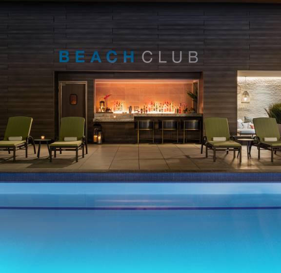 life cafe and lounge chairs by the pool