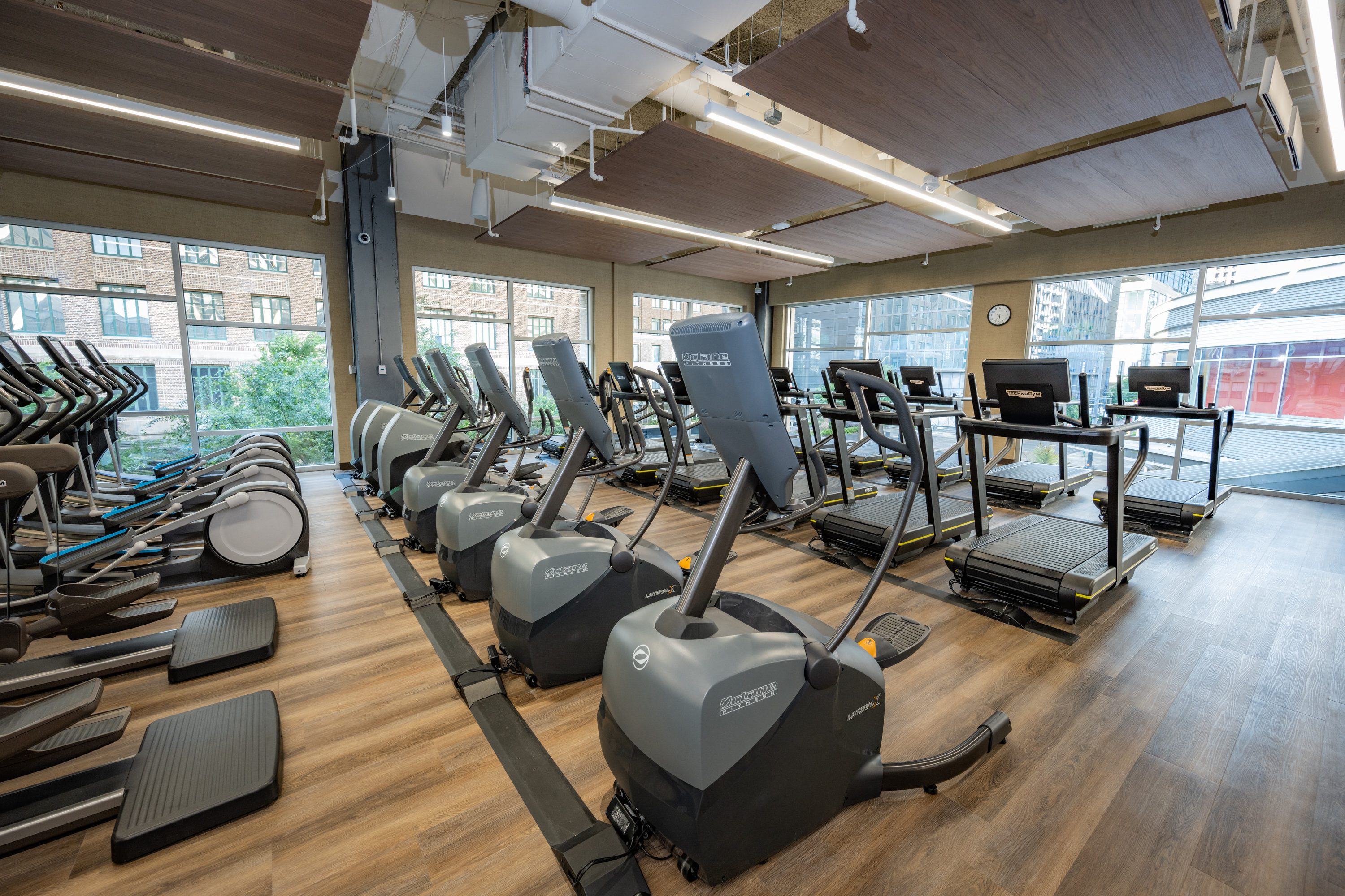 Cardio equipment on the fitness floor at Life Time