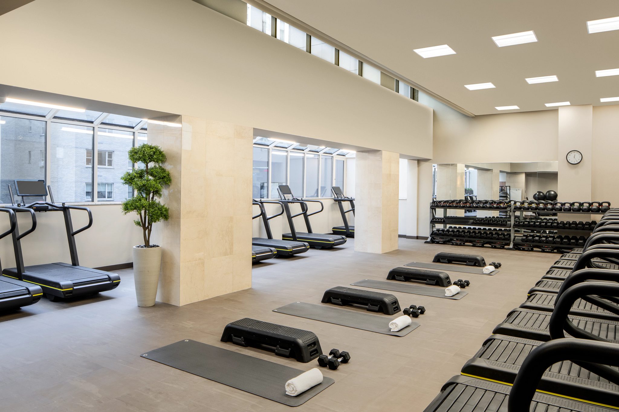 Cardio equipment on the fitness floor at the Life Time Midtown club location