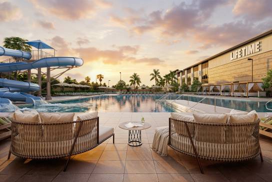 Outdoor pool and waterslide at the Life Time Winter Park club location