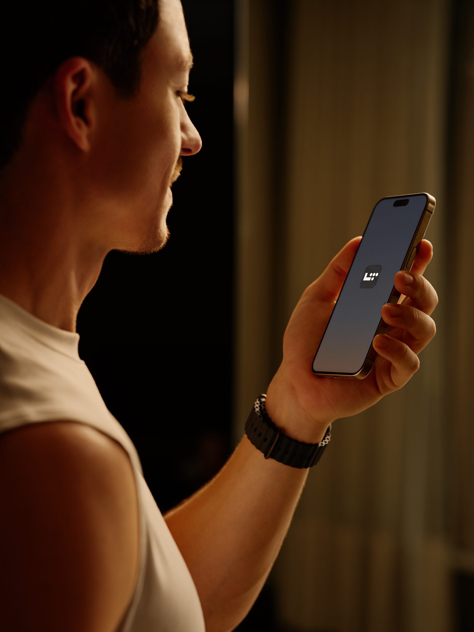 Closeup of a man looking at his phone