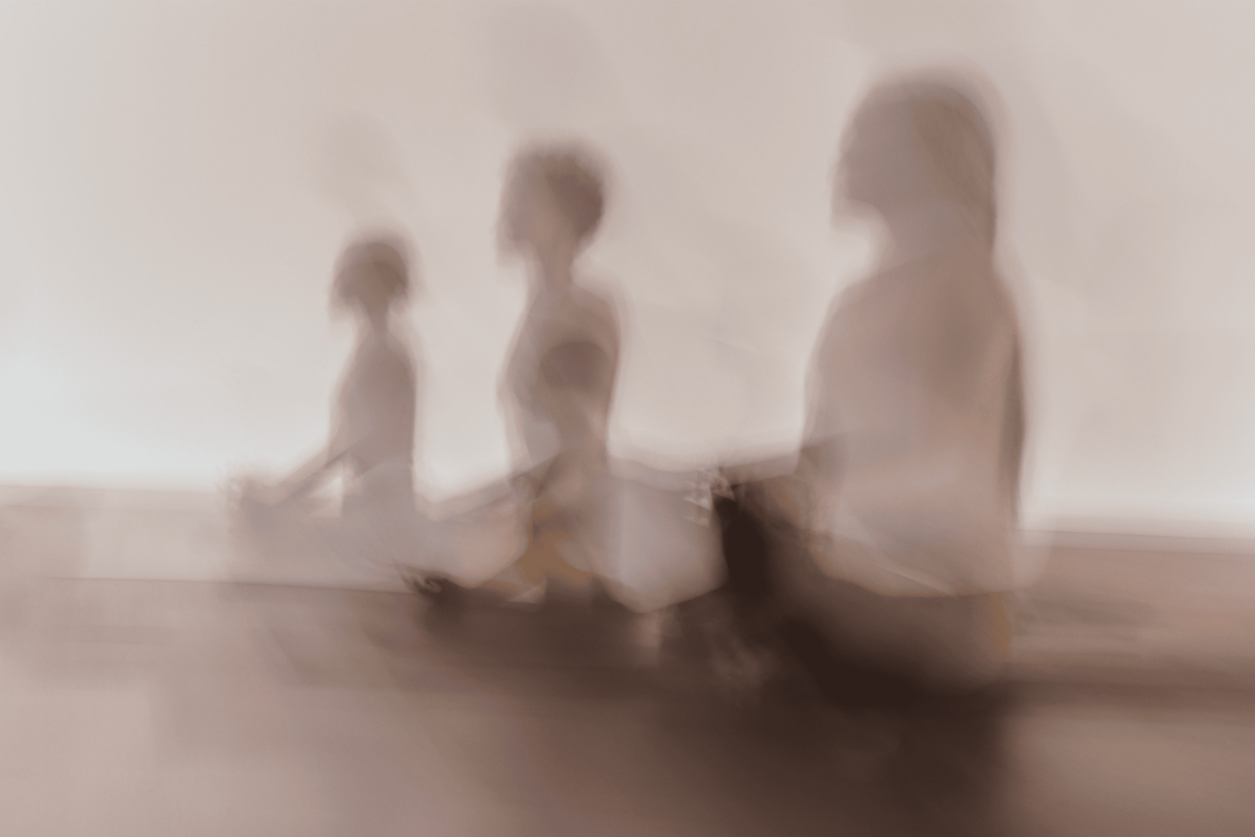 a group of women in a yoga surrender class