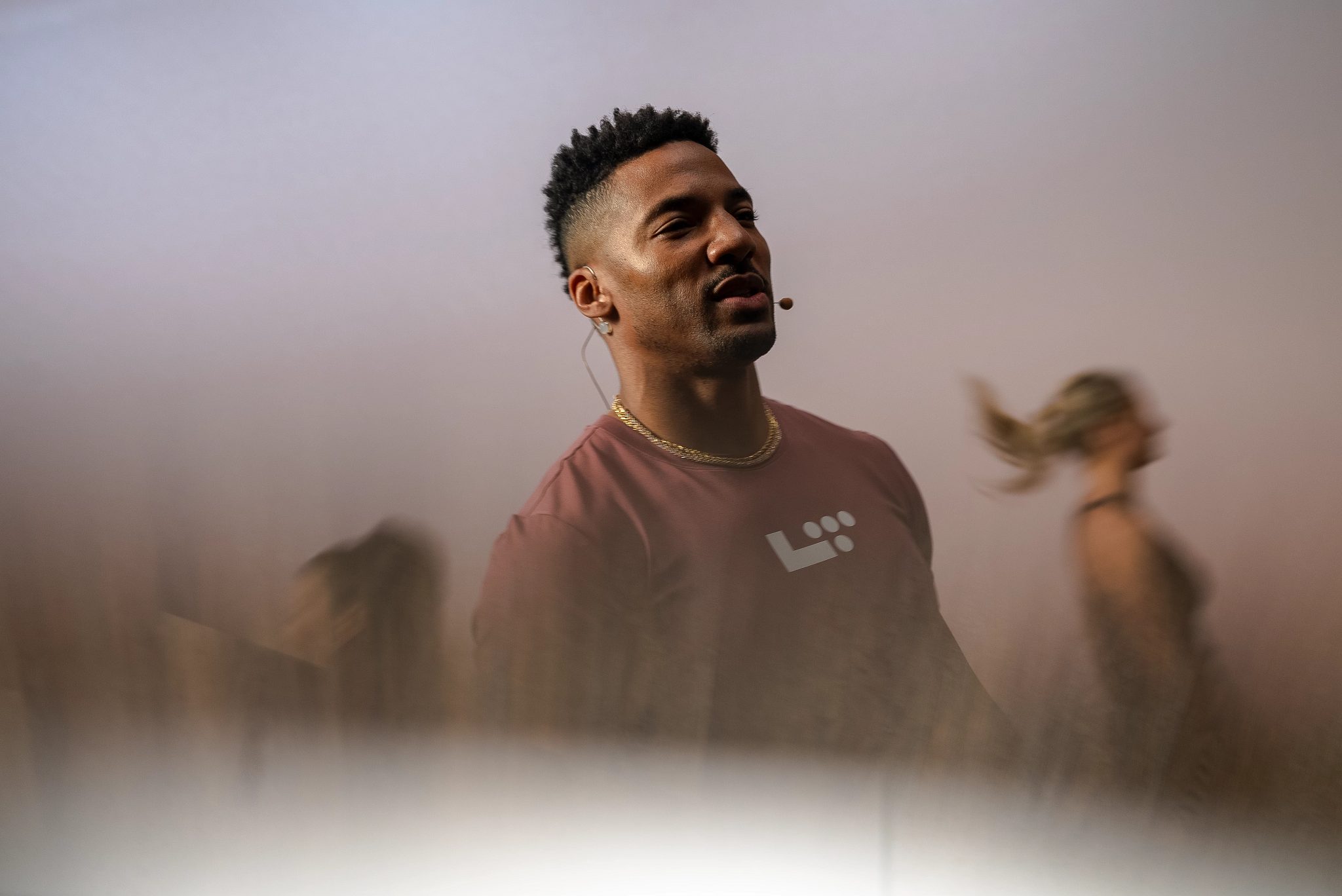 an instructor leading a group fitness class