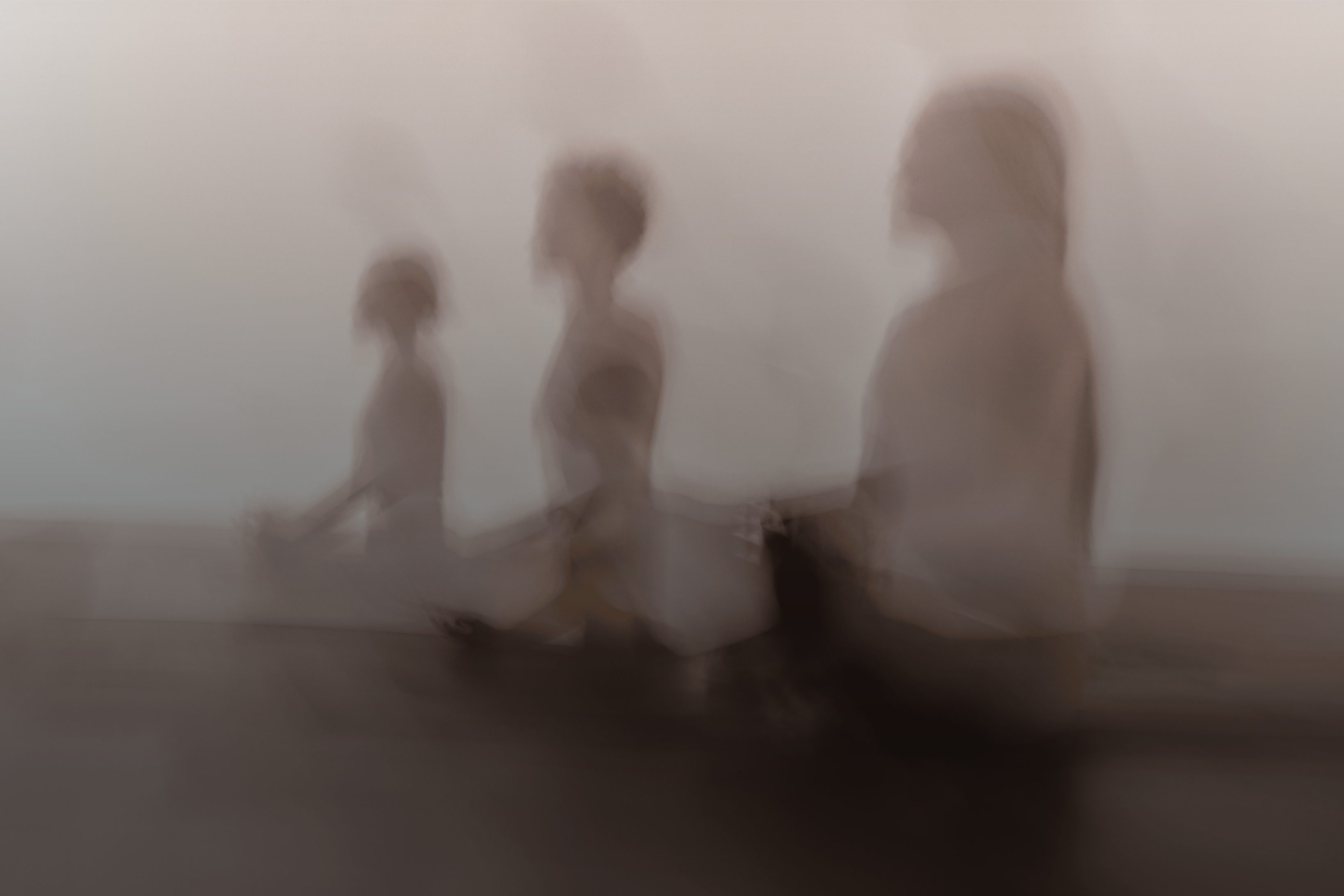 a group of people in a surrender yoga class