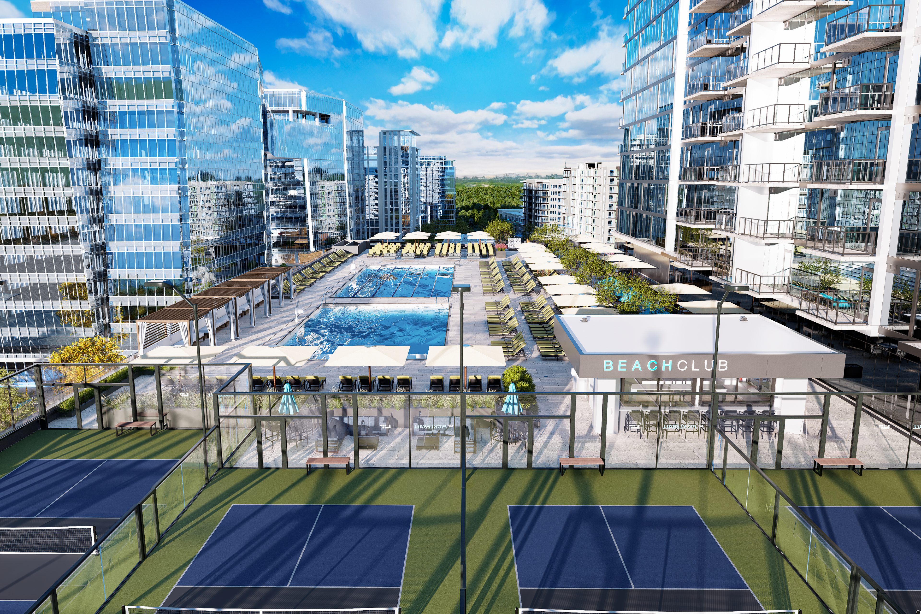 The birdseye view of the outdoor pool and pickleball courts at Raleigh Life Time Living.