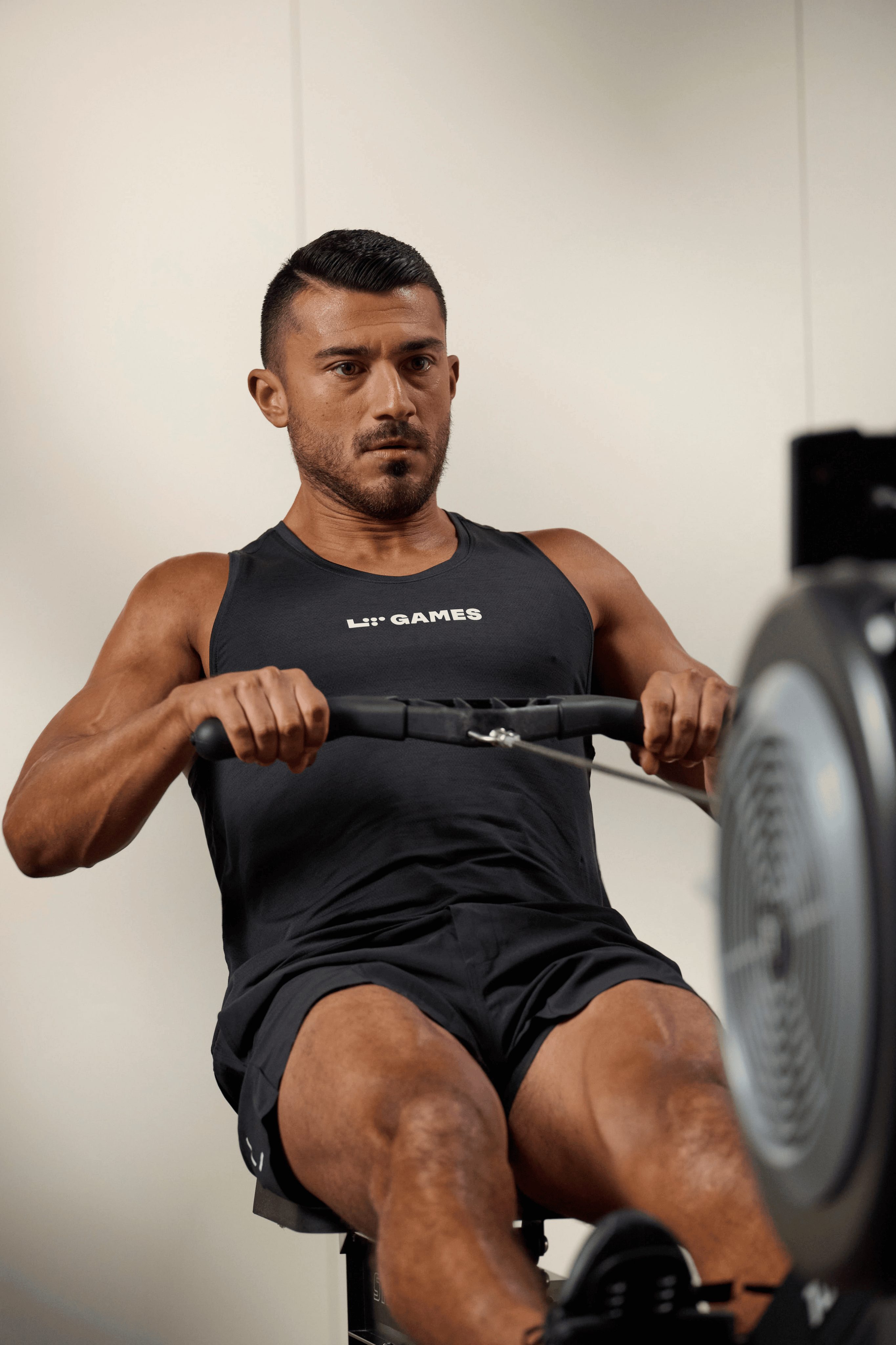 a man on a rowing machine