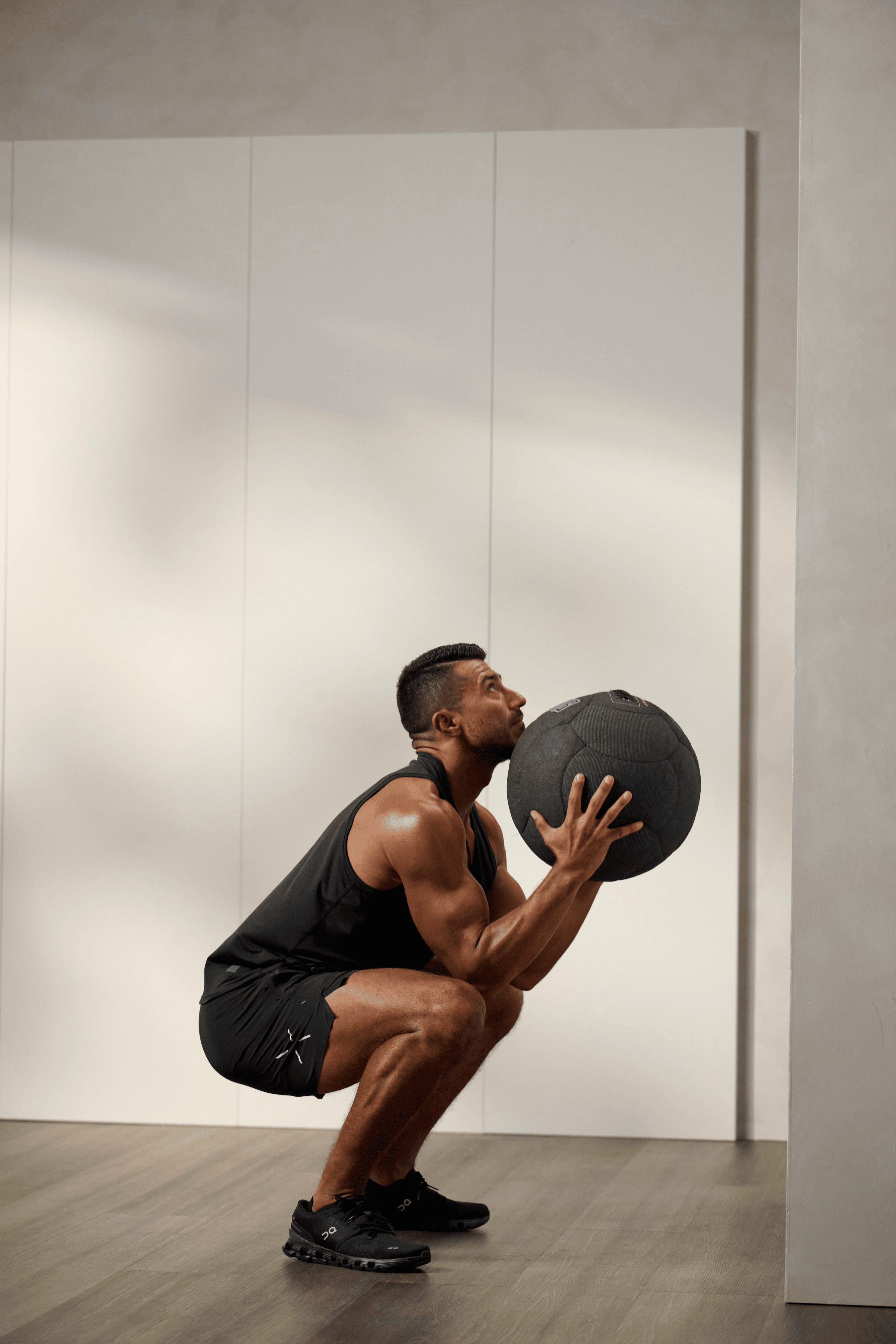 a man doing a wall ball