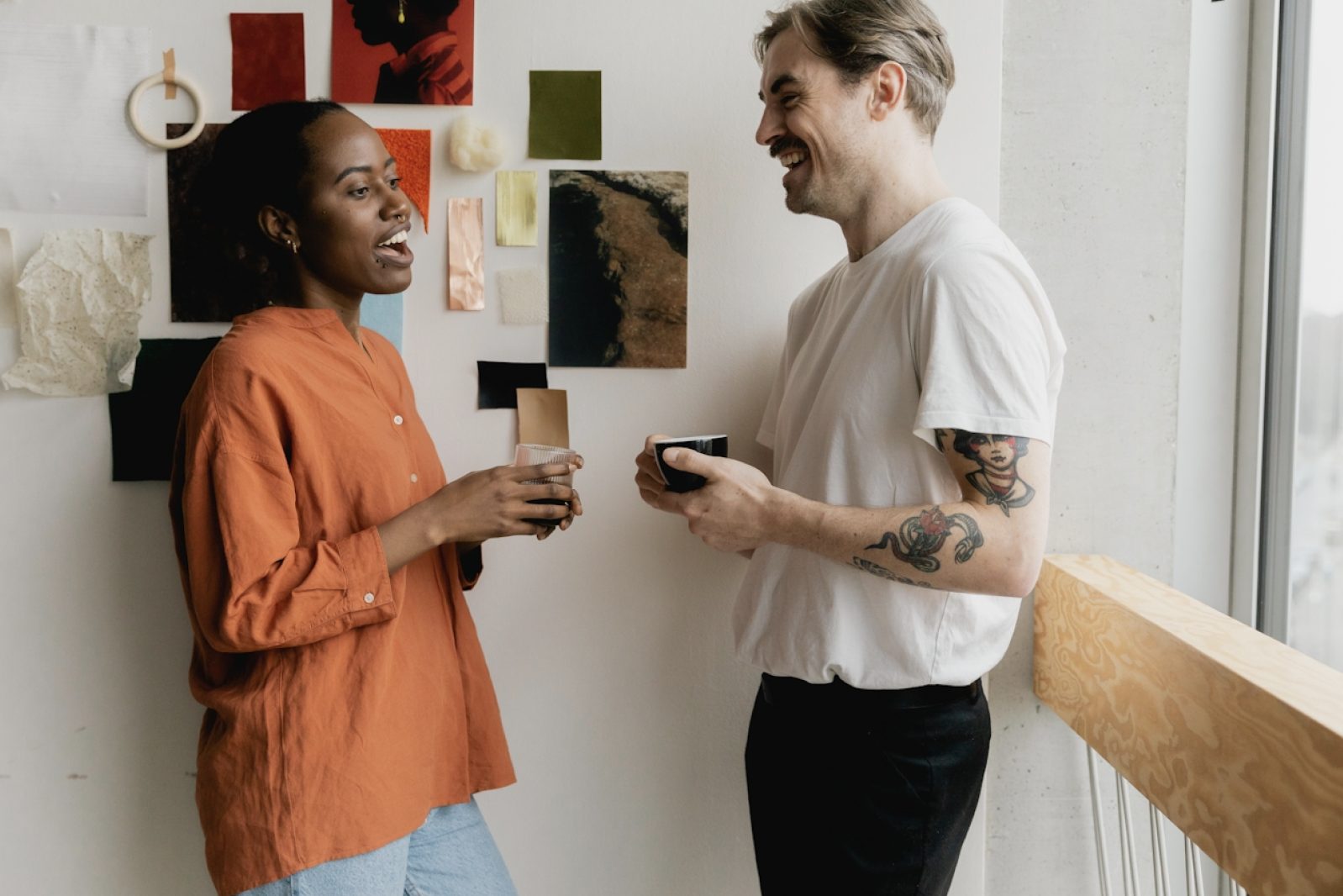 two people standing talking