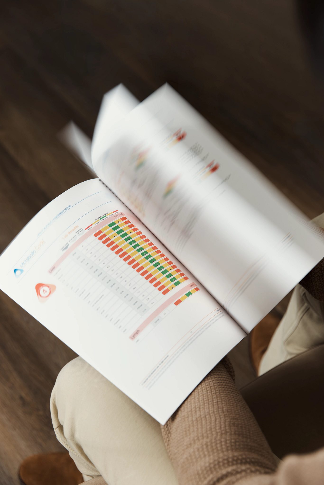 A patient flipping through pages of results during a MIORA consultation